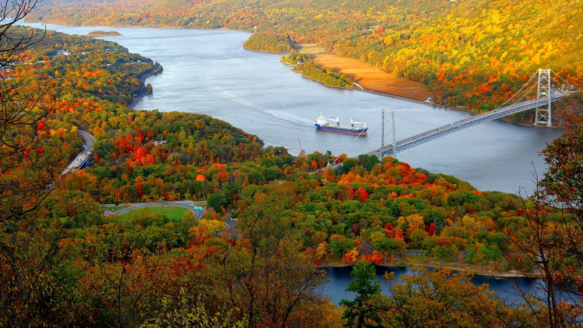 Autumn forest landscape with a ship and bridge over a river HD Wallpaper