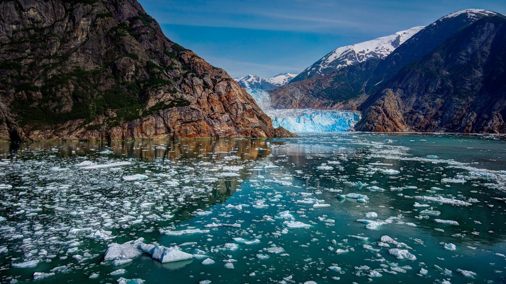 Glacier and icebergs in a mountain fjord HD Wallpaper