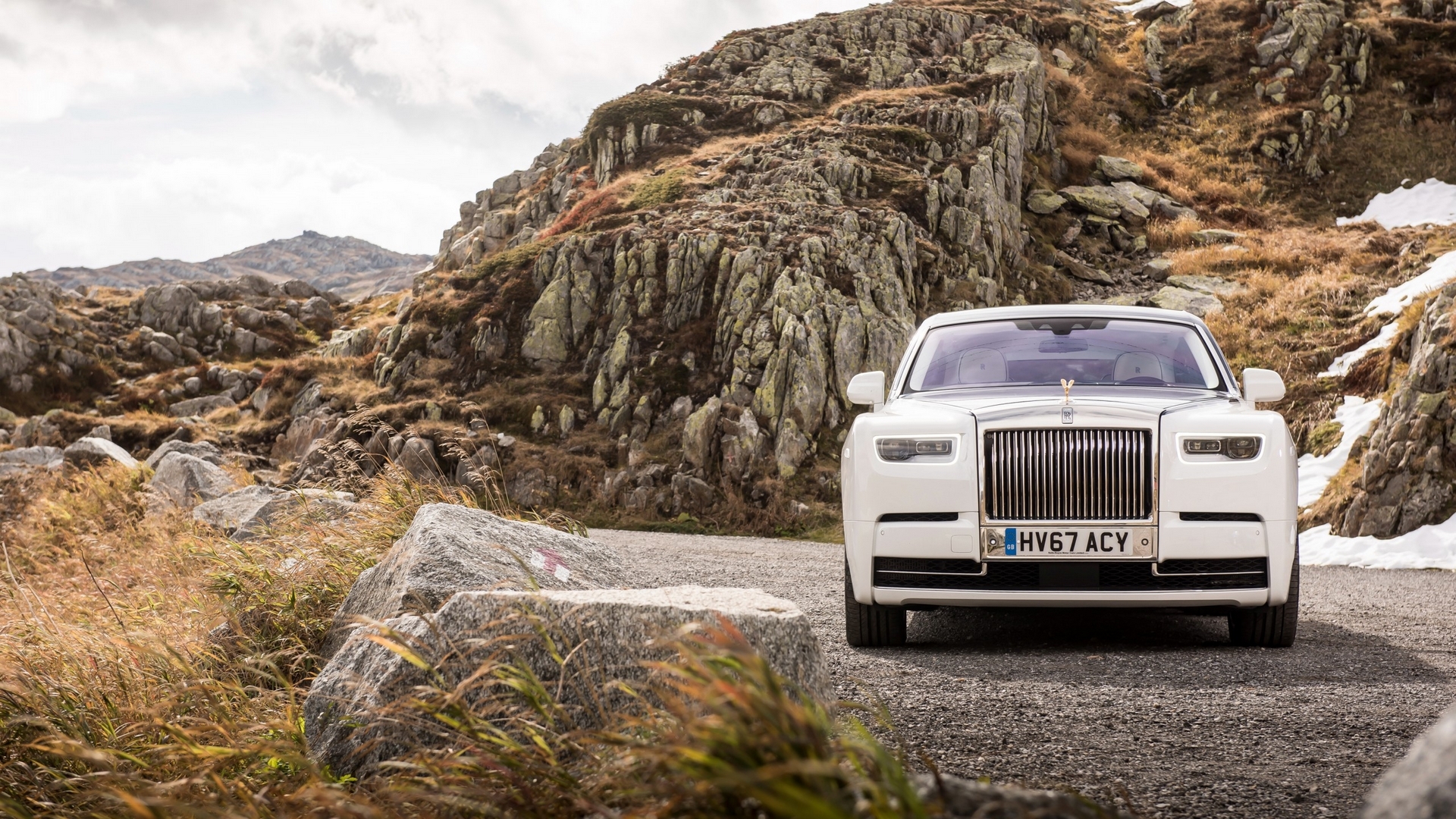 White Rolls-Royce Phantom on a mountain road HD Wallpaper