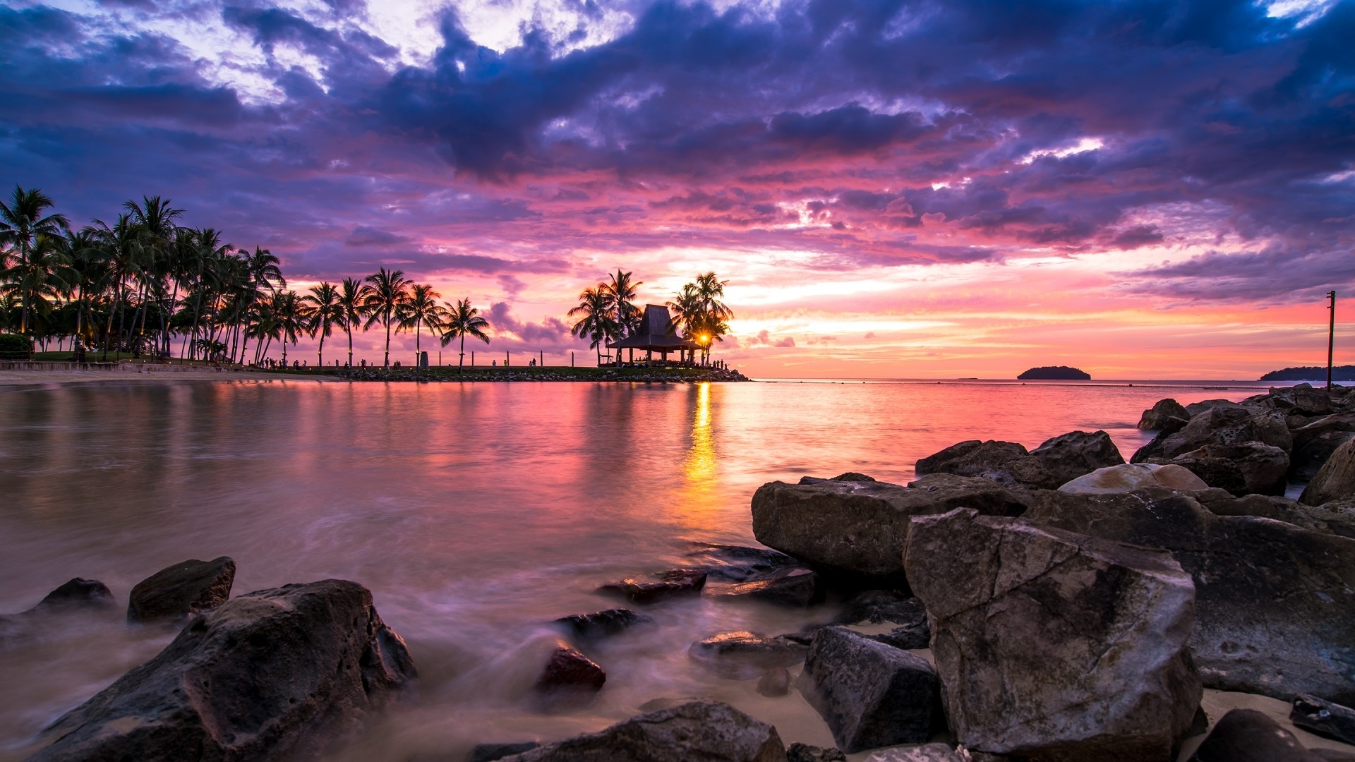 Tropical Beach Sunset with Vibrant Sky and Rocks HD Wallpaper