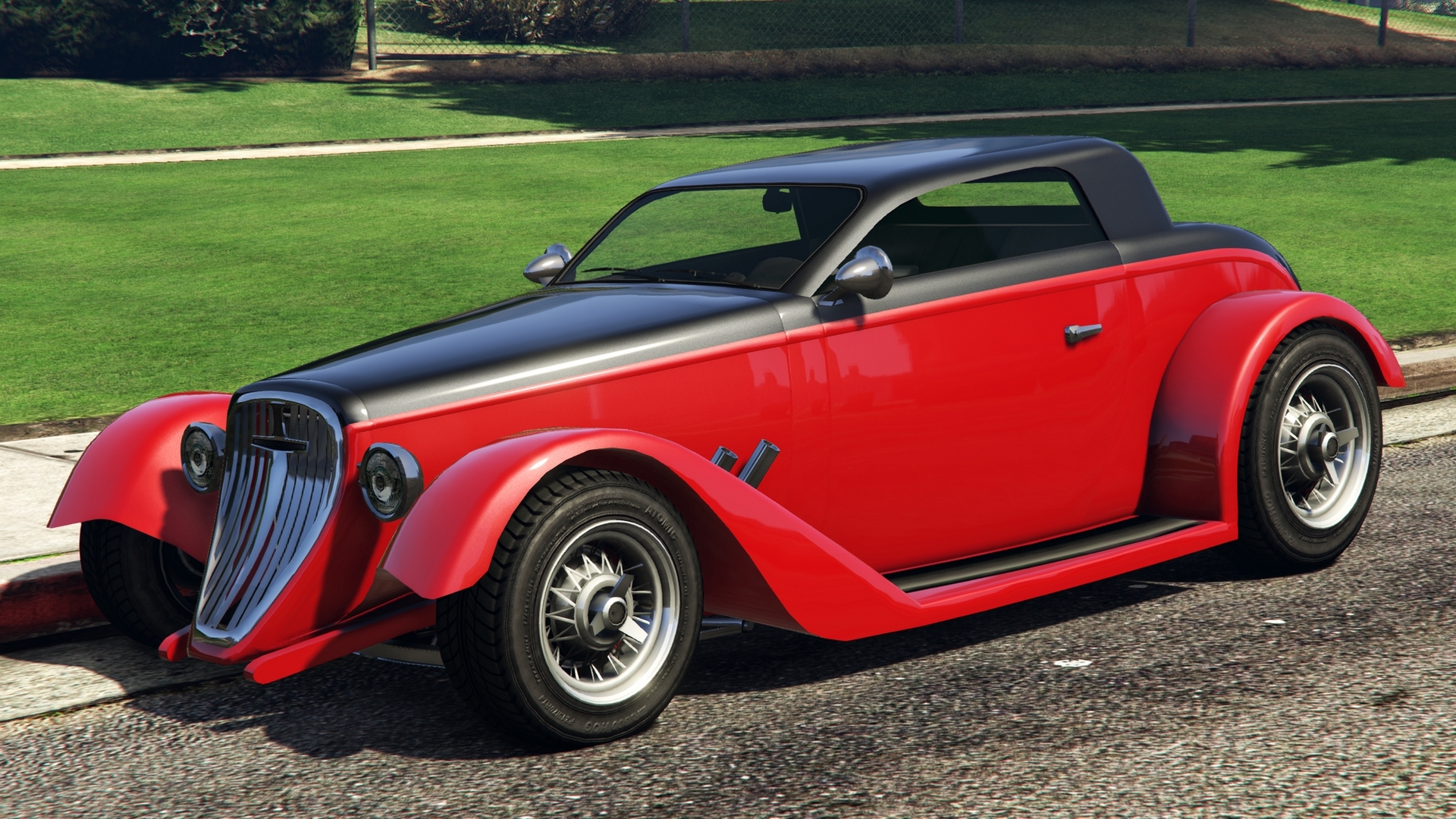 Red and black vintage convertible car on a street HD Wallpaper