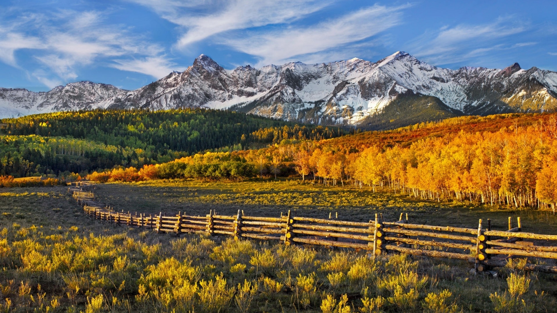 Autumn mountains with a wooden fence in a field HD Wallpaper
