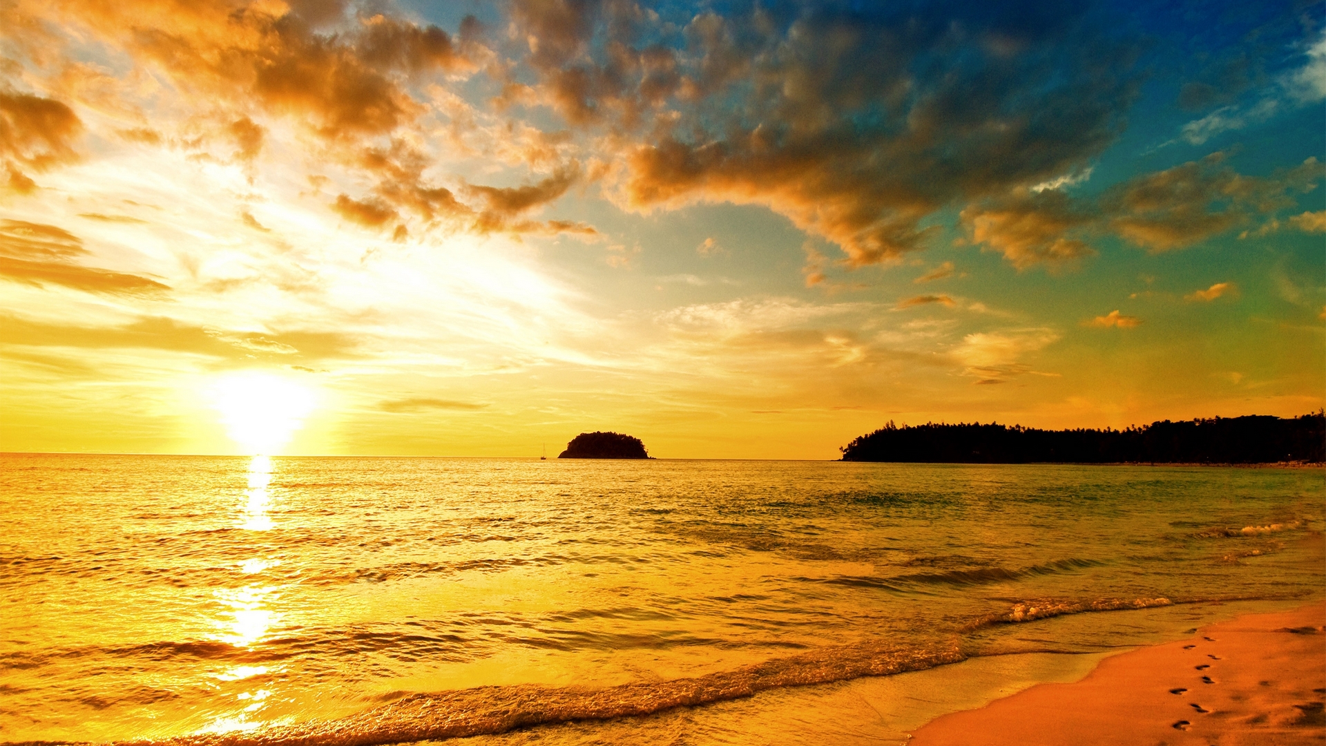 Sunset over the ocean with islands and beach HD Wallpaper