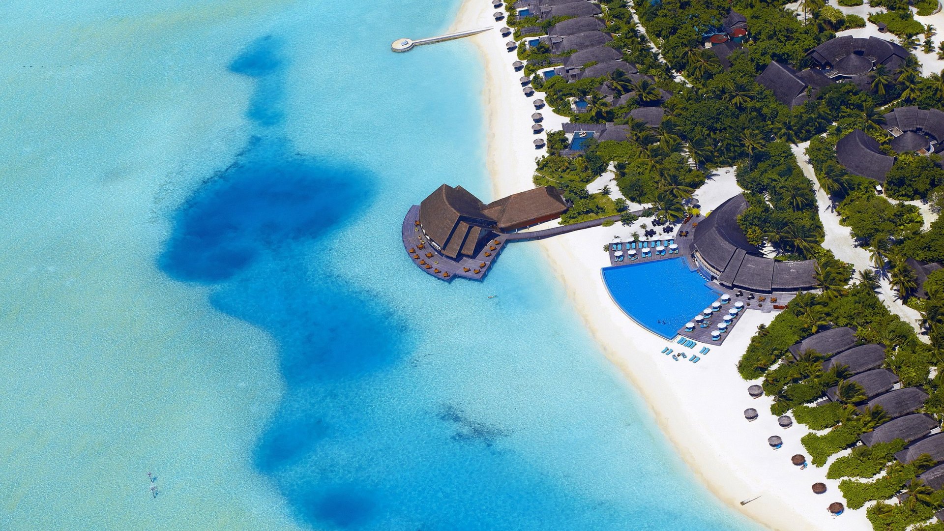 Aerial view of a tropical resort in the Maldives HD Wallpaper
