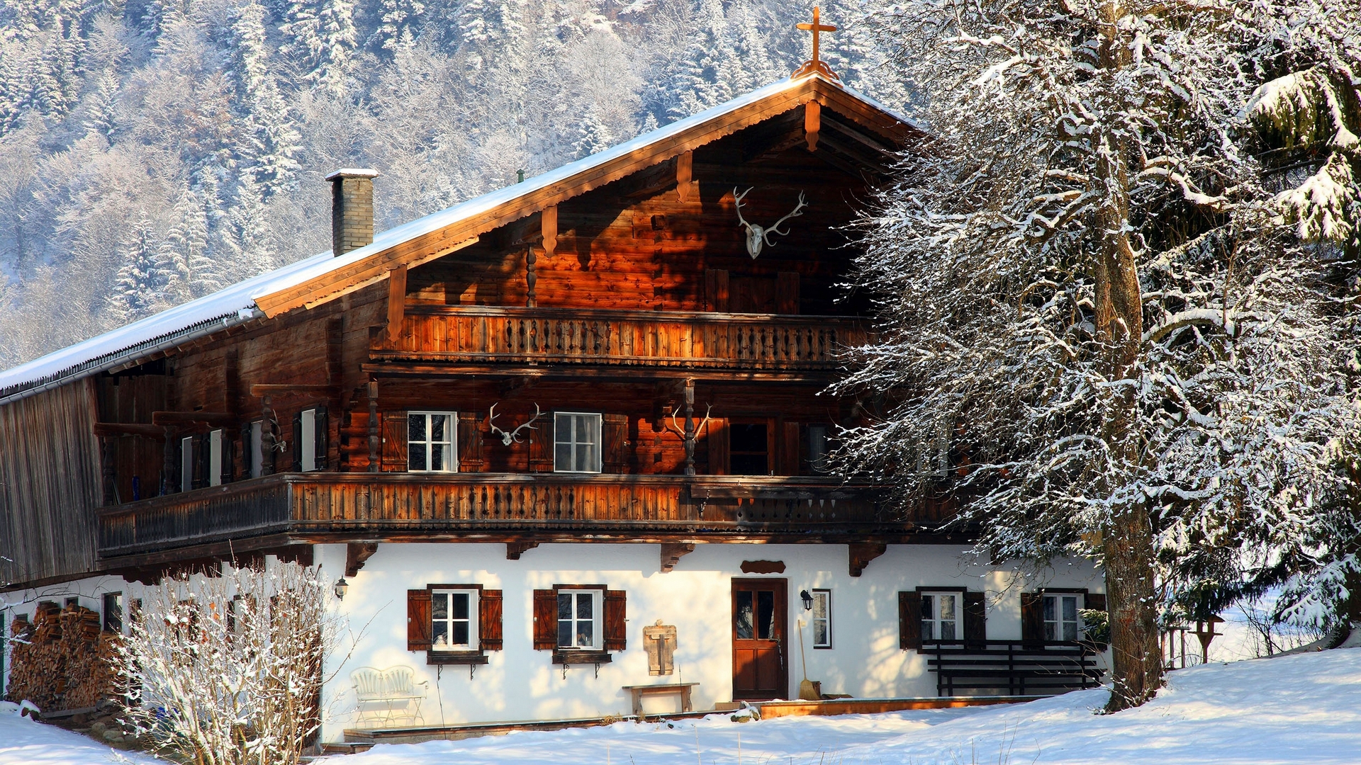 Snow-Covered Wooden Chalet in Winter Mountain Landscape HD Wallpaper