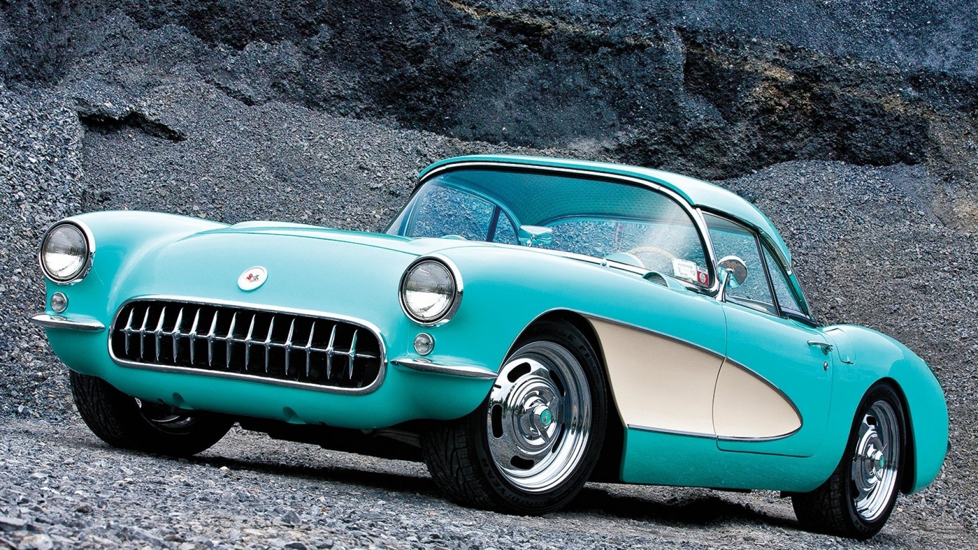 Turquoise Chevrolet Corvette C1 parked on gravel HD Wallpaper