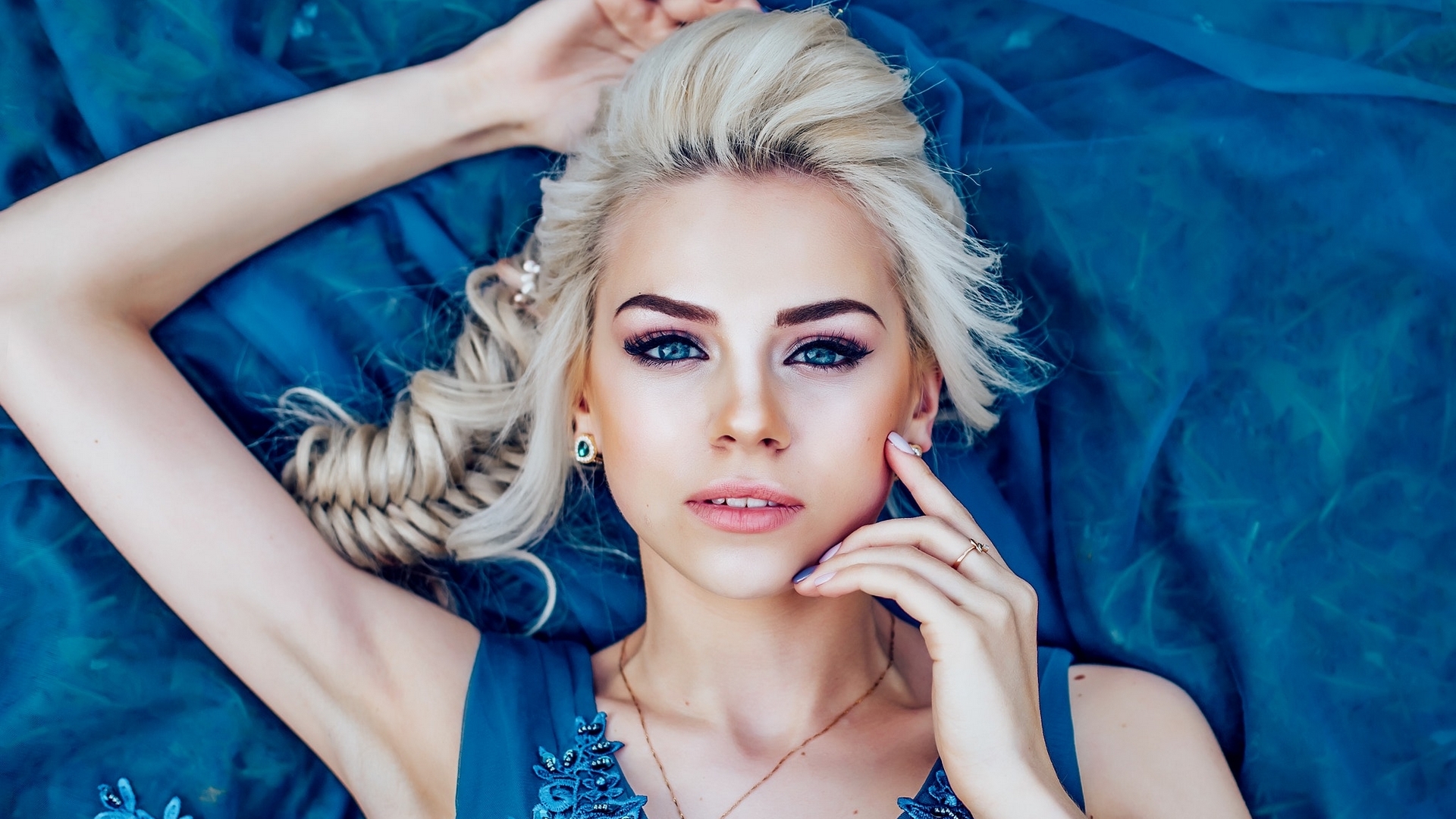 Elegant Blonde Woman with Blue Eyes and Dress HD Wallpaper