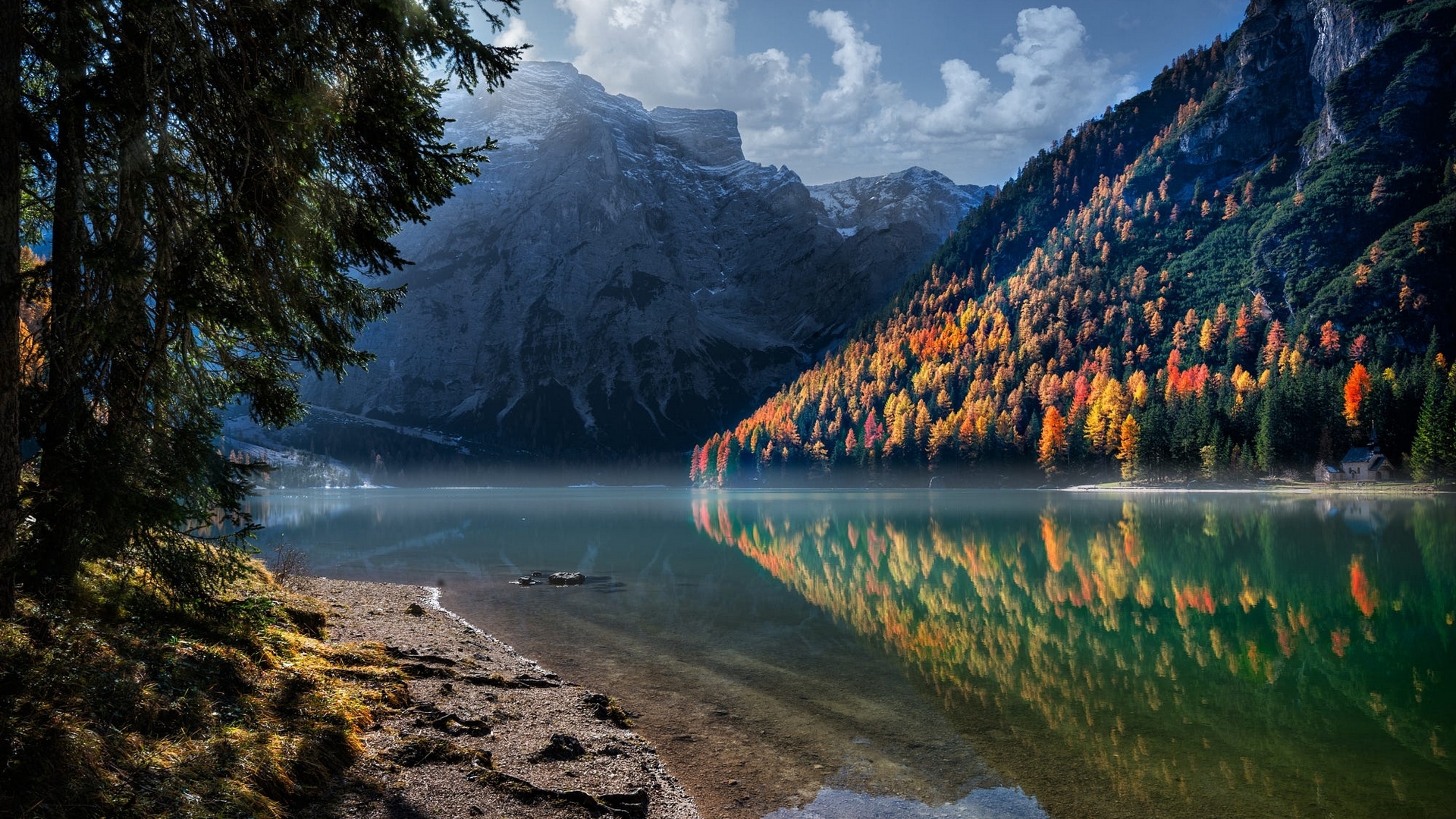 Autumn forest reflected in a mountain lake HD Wallpaper