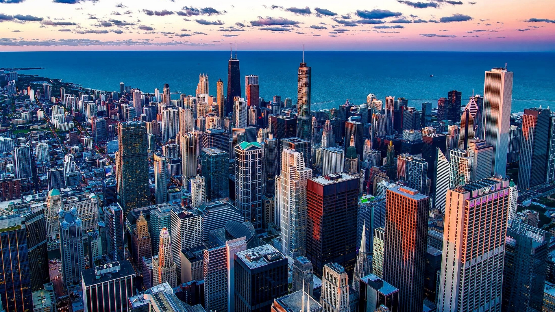 Chicago skyline with Lake Michigan at sunset HD Wallpaper