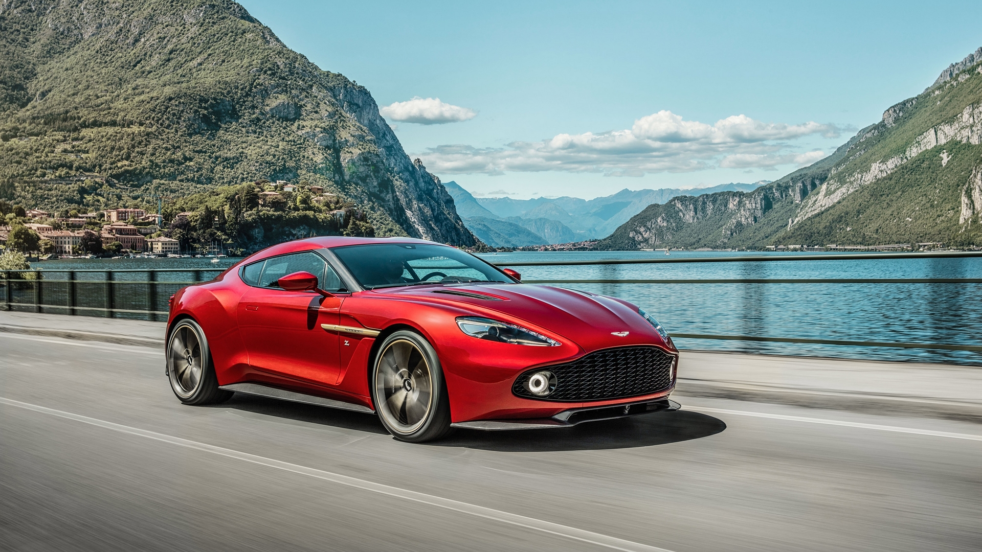 Aston Martin Vanquish Zagato driving by a lake HD Wallpaper