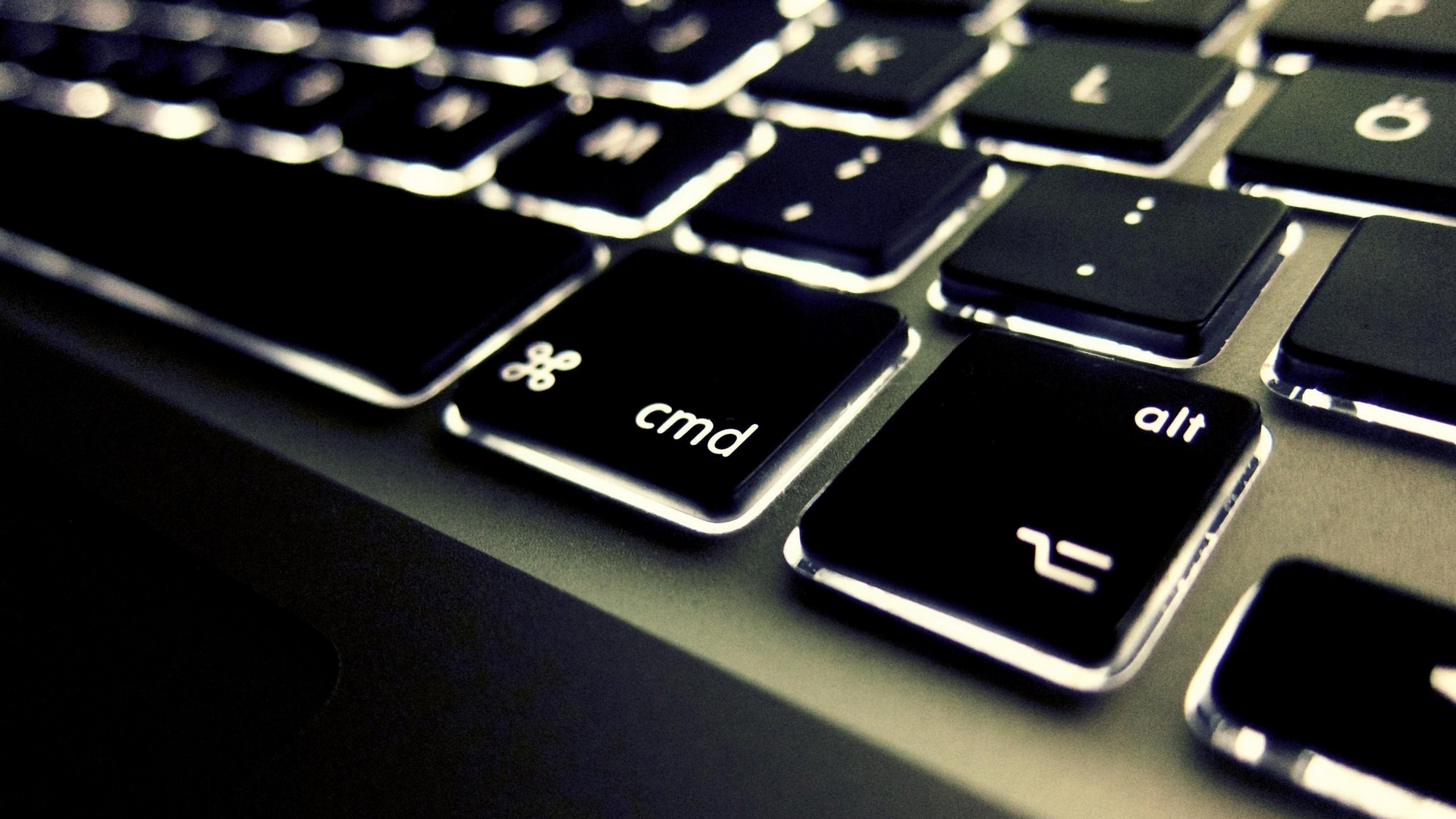 Close-up of a backlit Apple keyboard HD Wallpaper