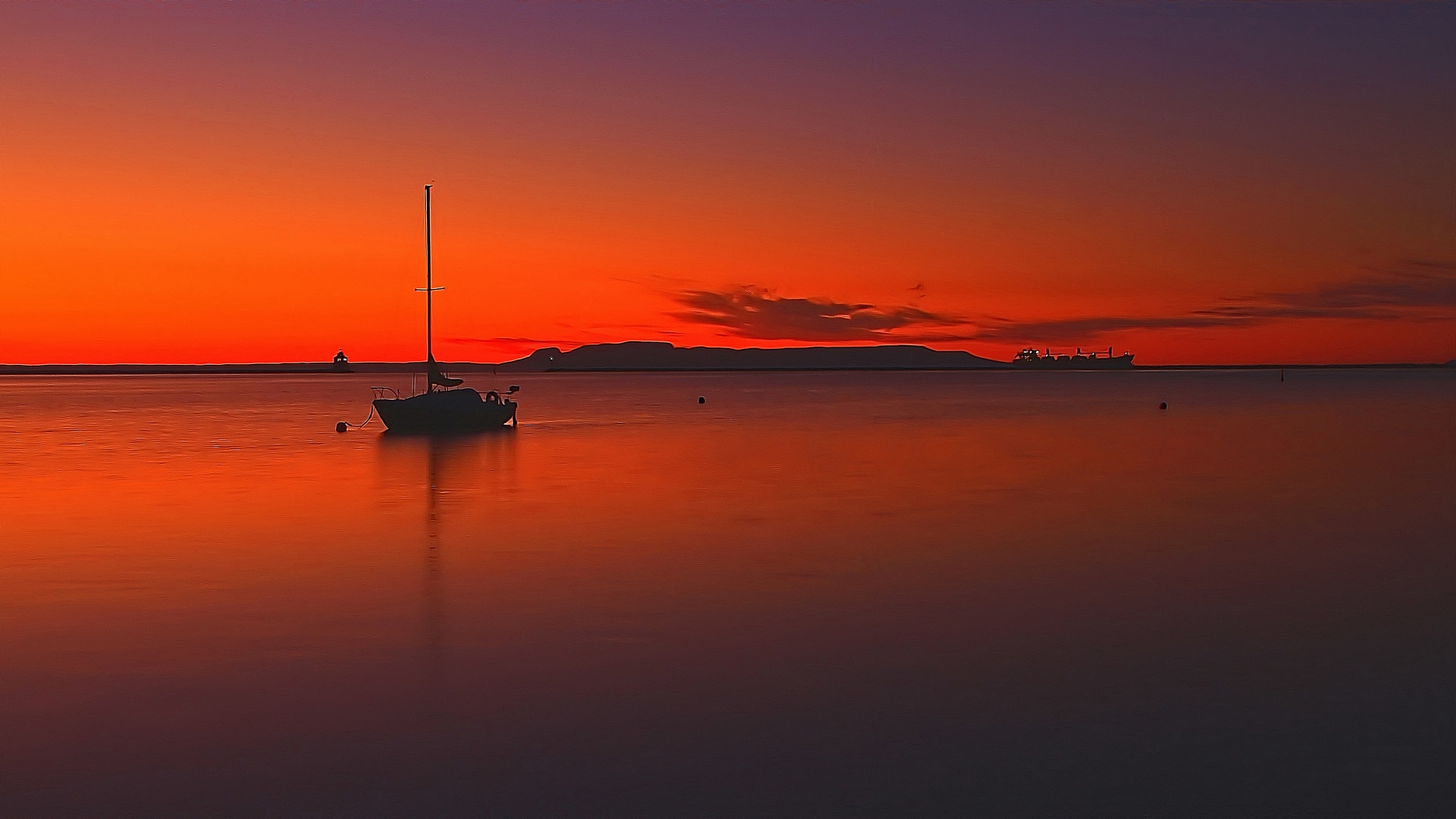 Sailboat drifting on calm water at sunset HD Wallpaper