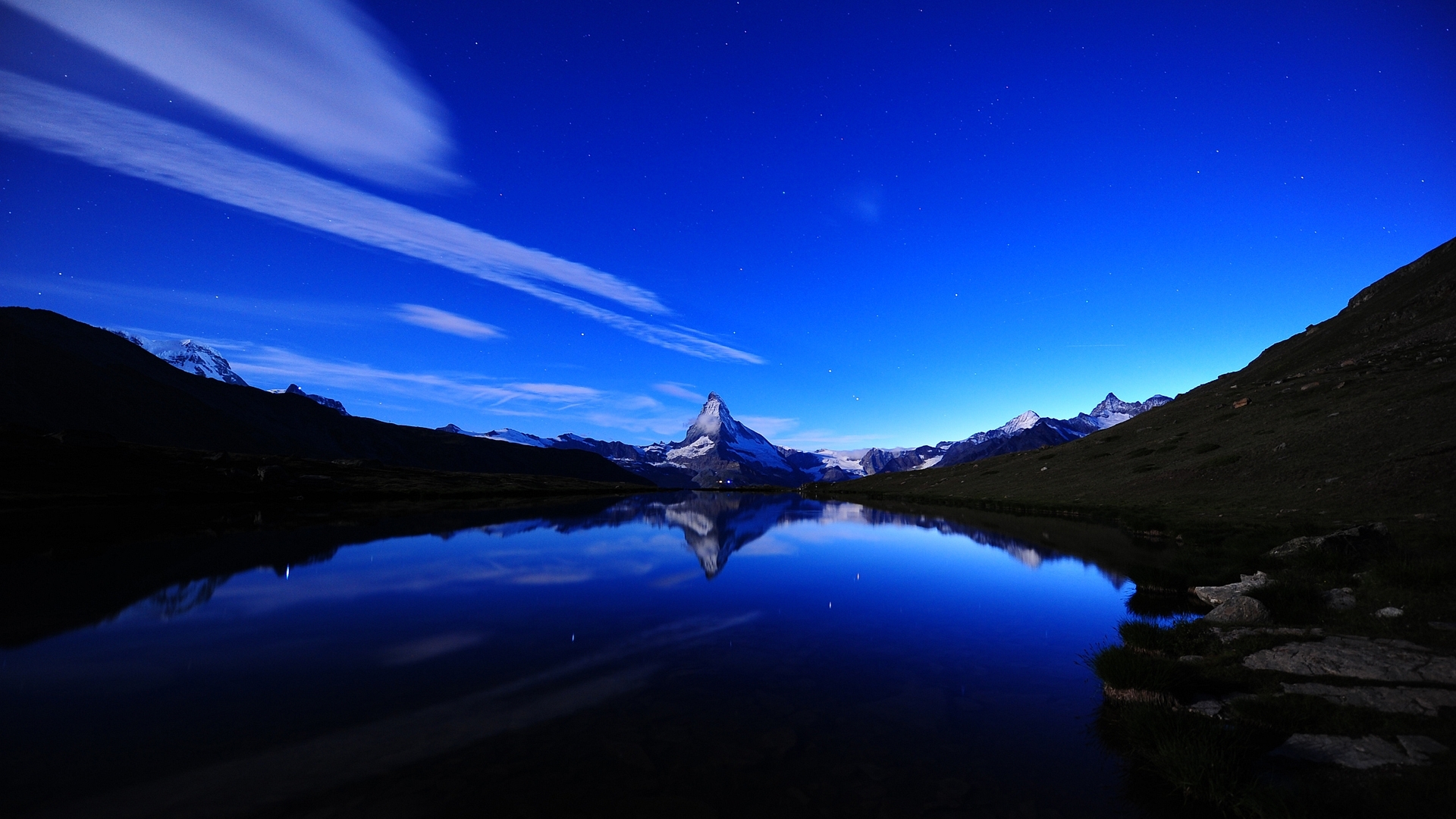 Matterhorn reflected in a lake at night HD Wallpaper