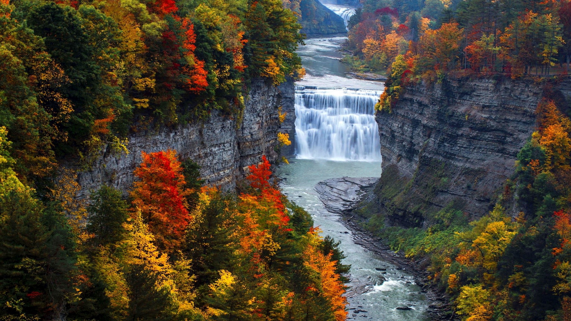 Waterfall in a canyon with autumn trees HD Wallpaper