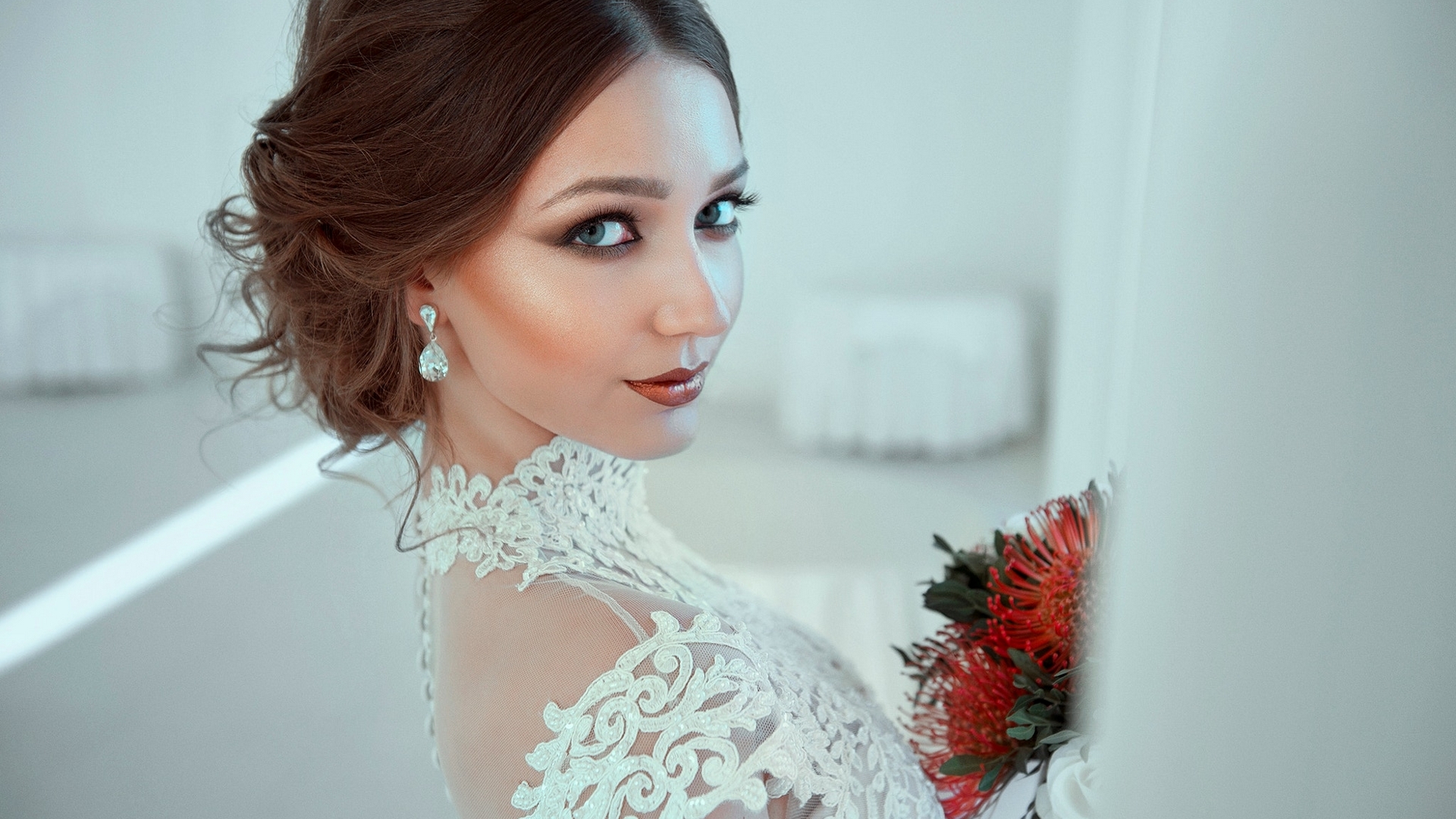 Woman with bouquet and diamond earrings HD Wallpaper