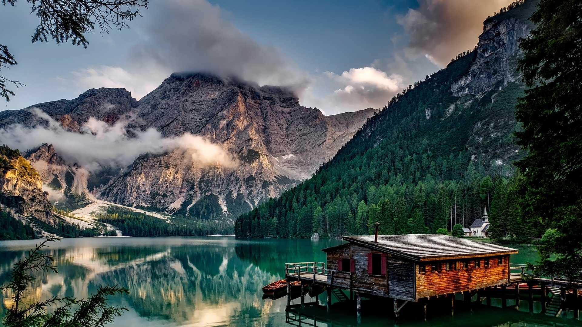 Wooden boathouse on a lake with mountains and forest HD Wallpaper