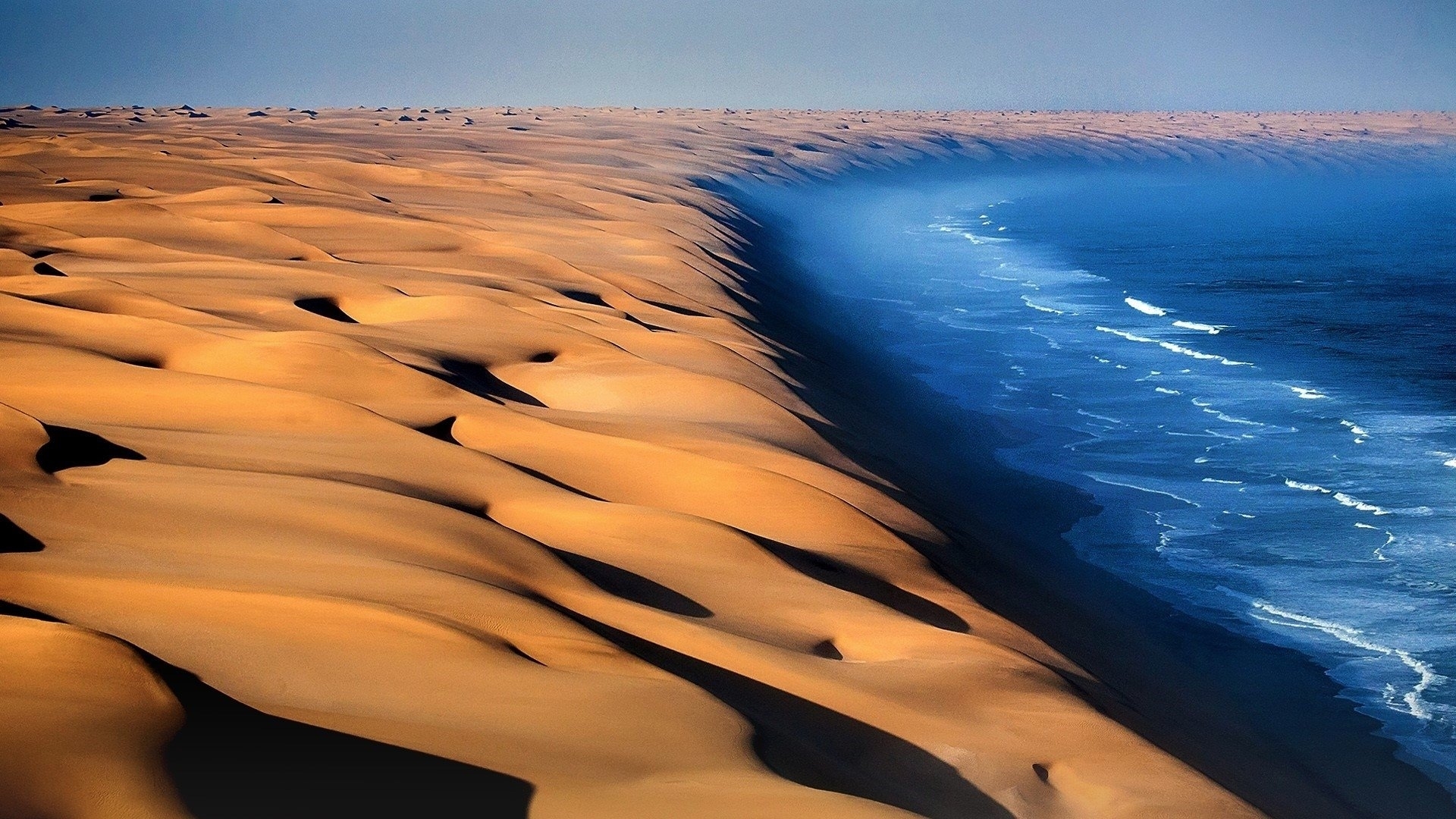 Namib Desert dunes meet the Atlantic Ocean HD Wallpaper