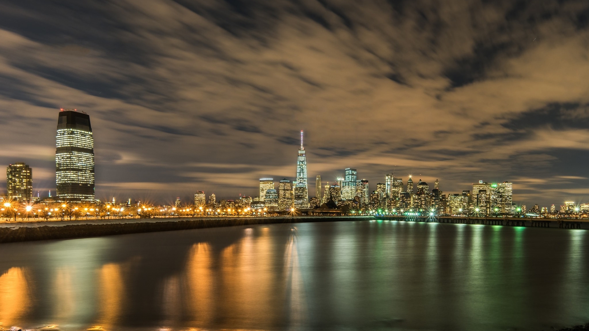 New York City skyline at night with reflections HD Wallpaper