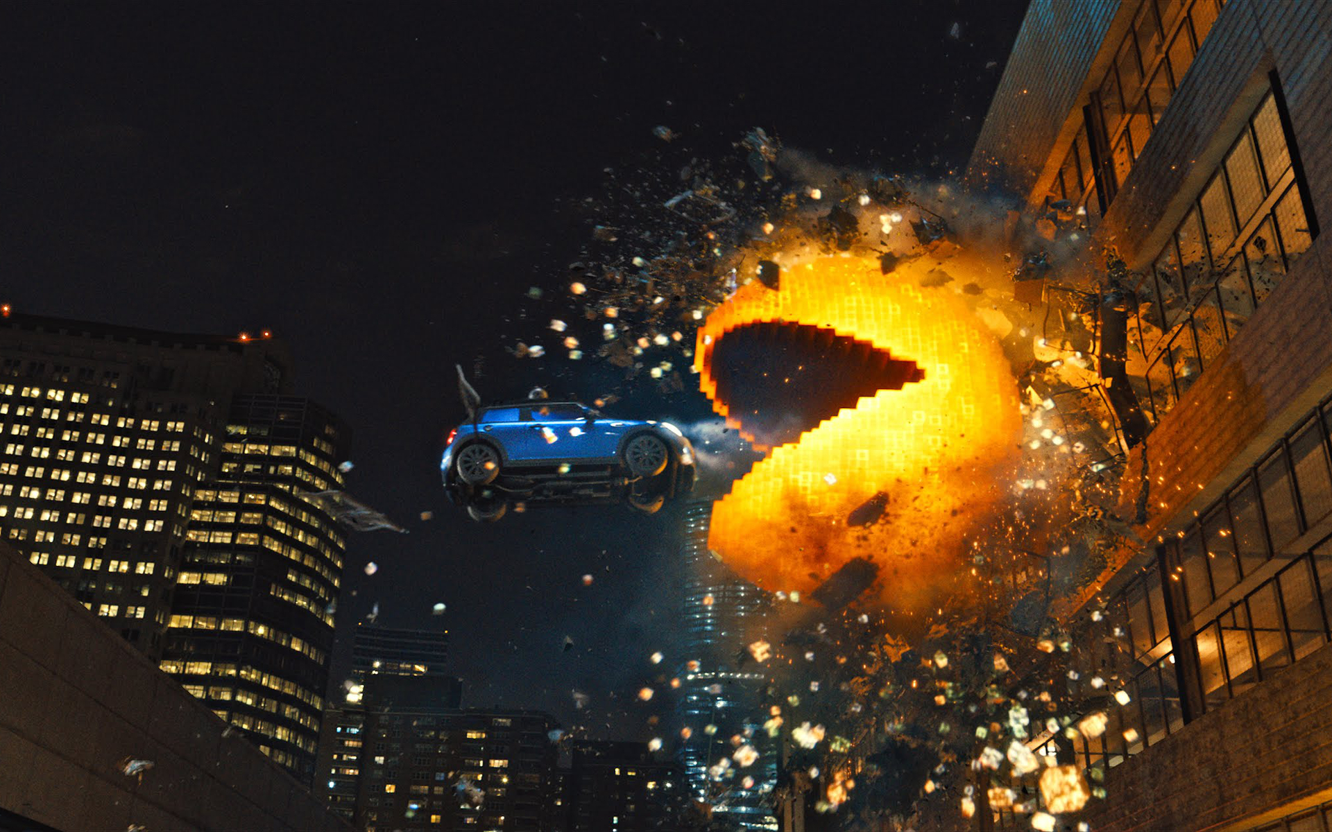 Pac-Man destroying building with car in foreground HD Wallpaper