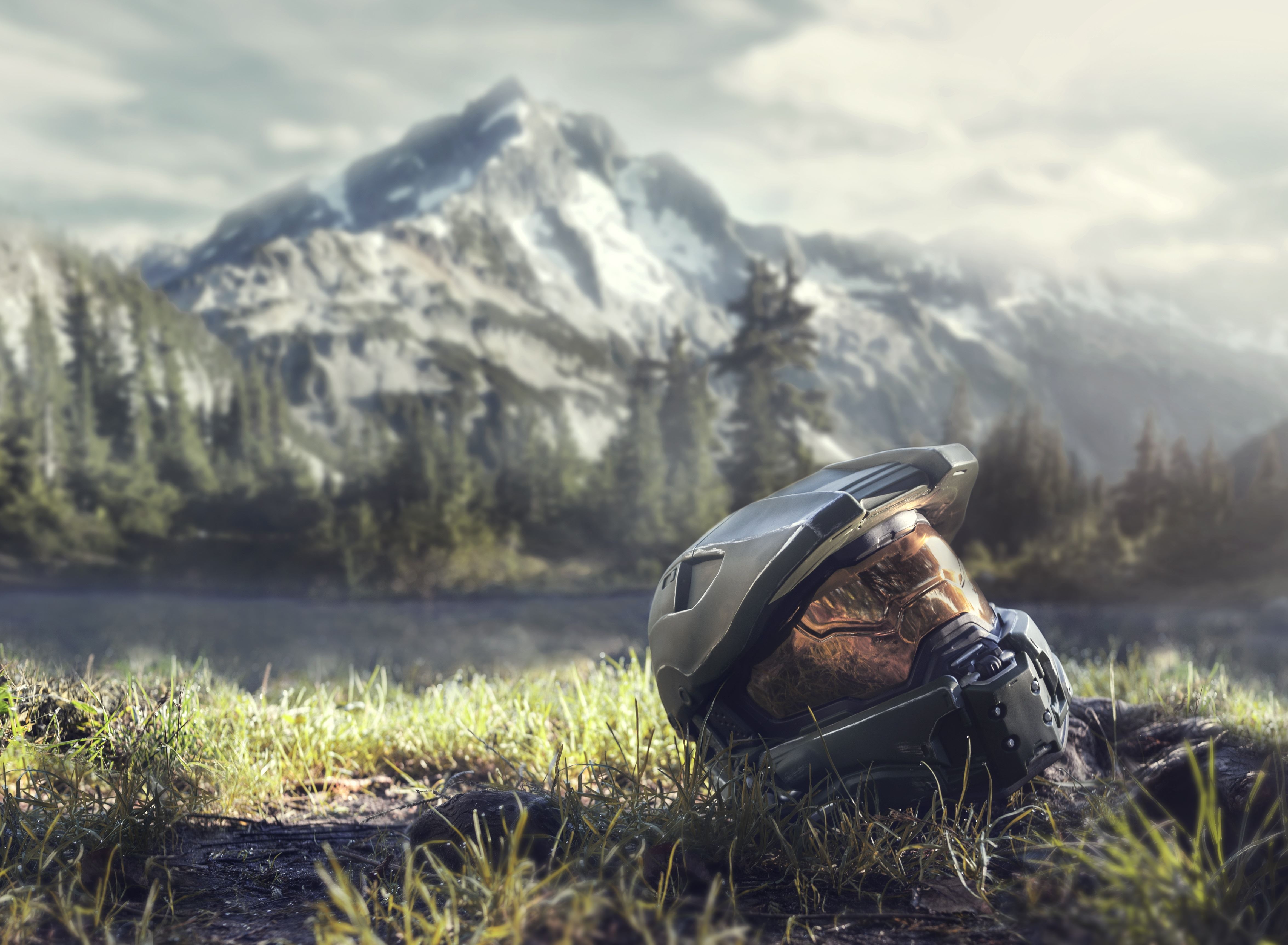 Master Chief helmet in a mountain landscape HD Wallpaper