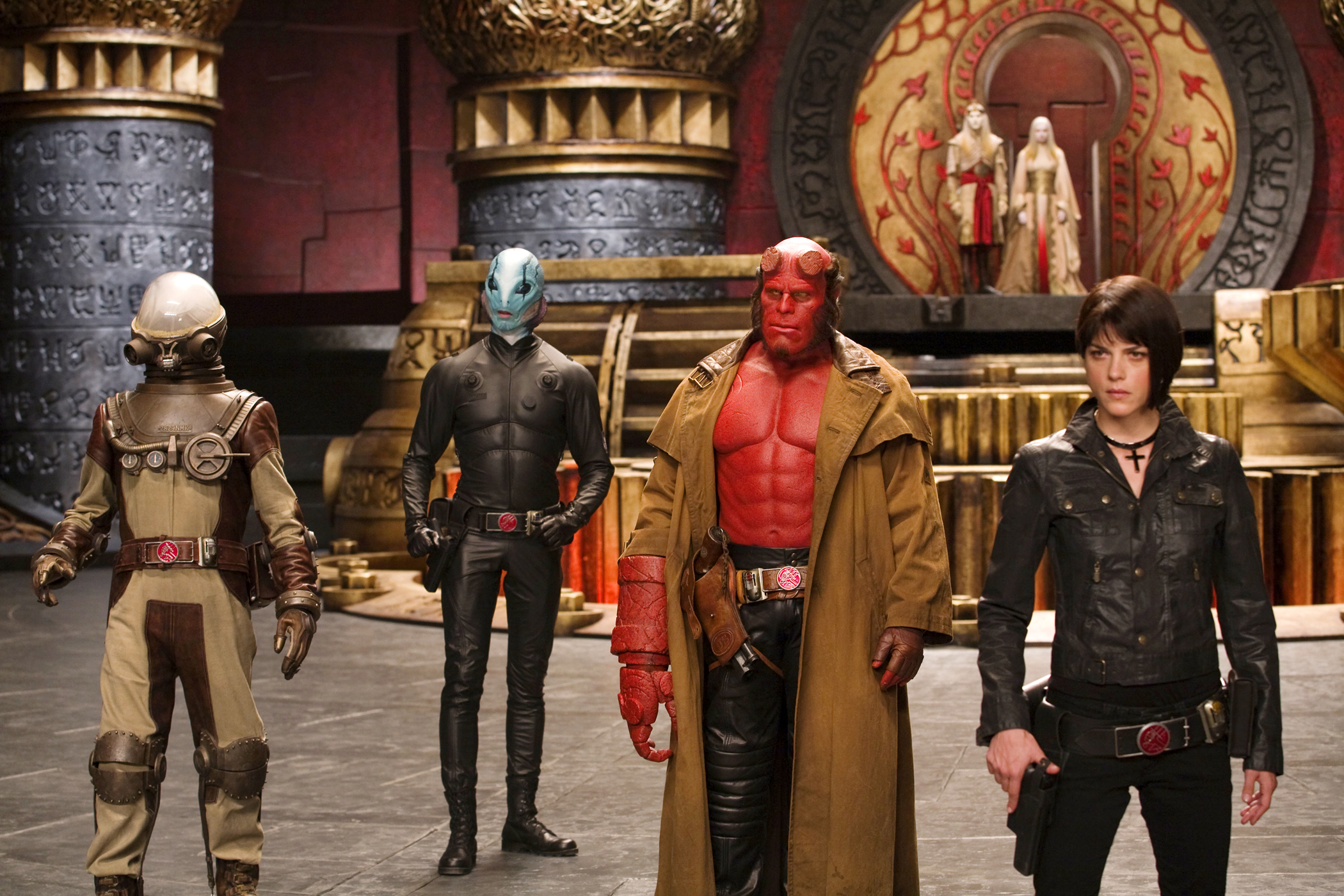 Hellboy and allies in a grand hall HD Wallpaper