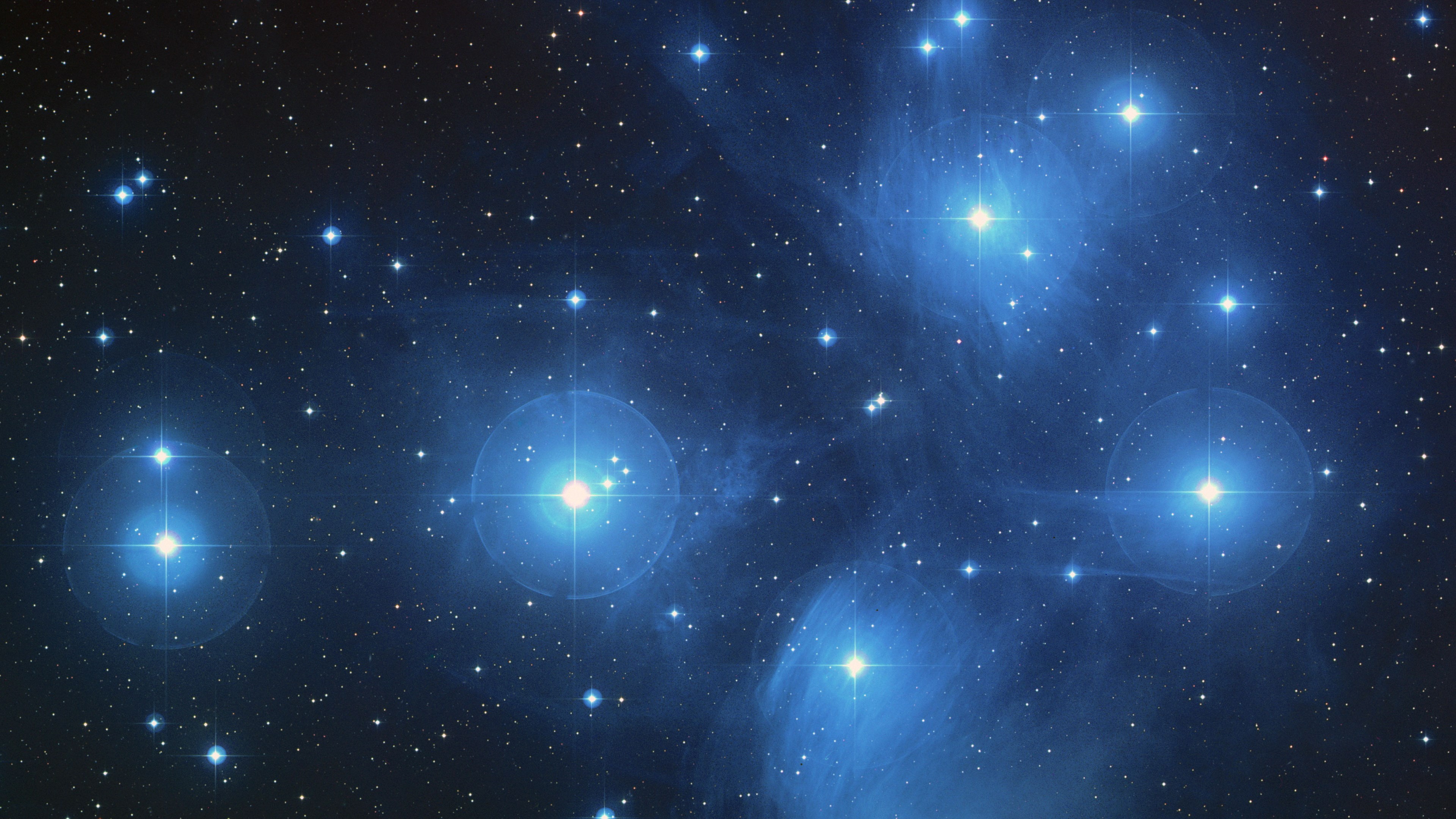 The Pleiades star cluster in deep space HD Wallpaper