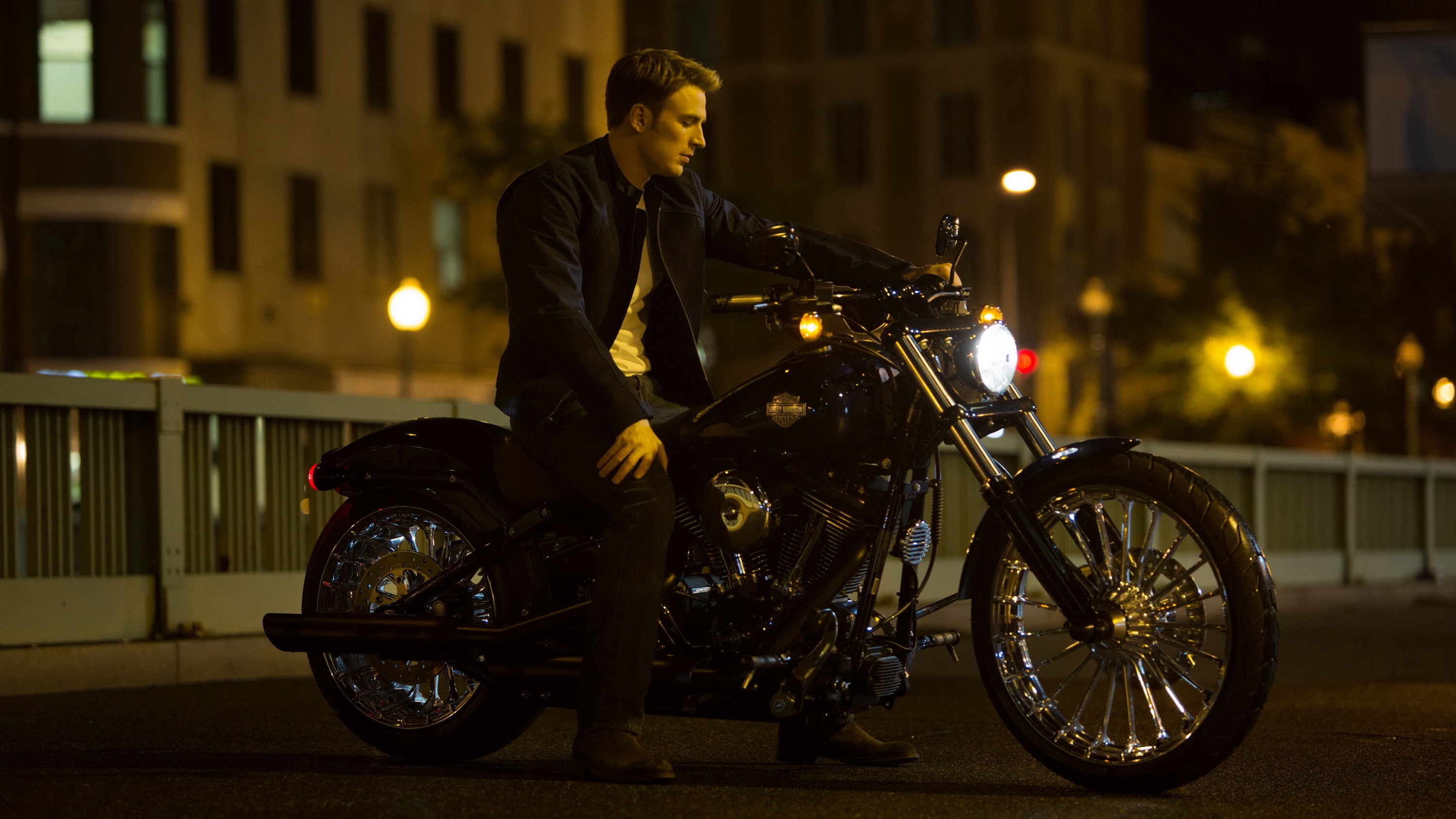 Steve Rogers on a motorcycle at night HD Wallpaper