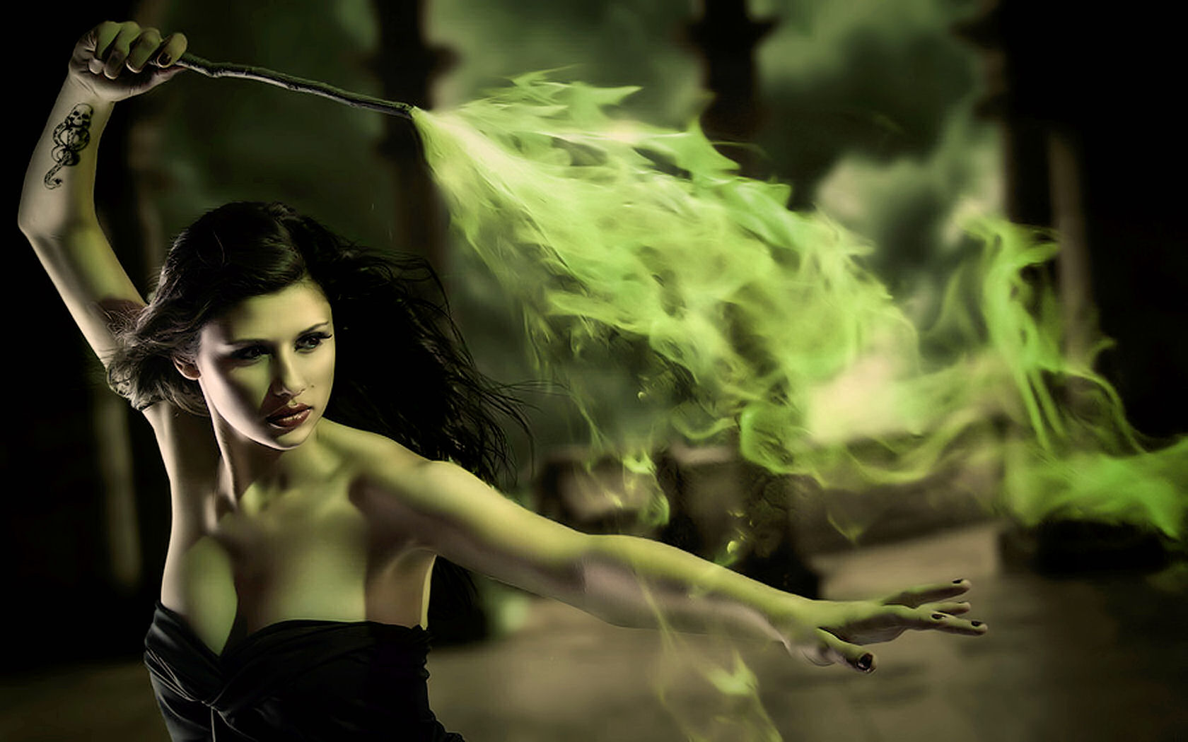 Woman casting green magic from a wand HD Wallpaper