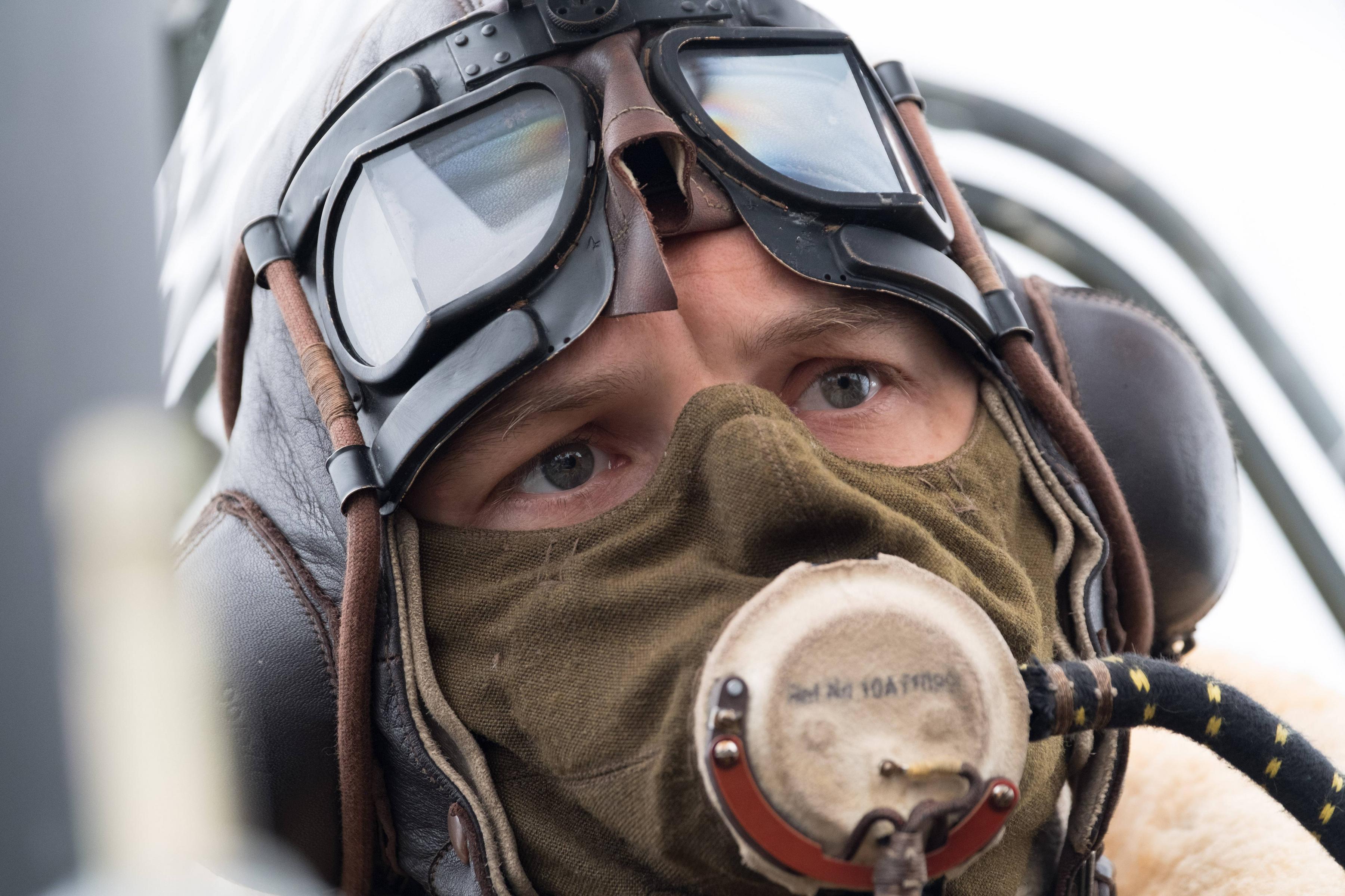 Tom Hardy as a pilot in a cockpit HD Wallpaper