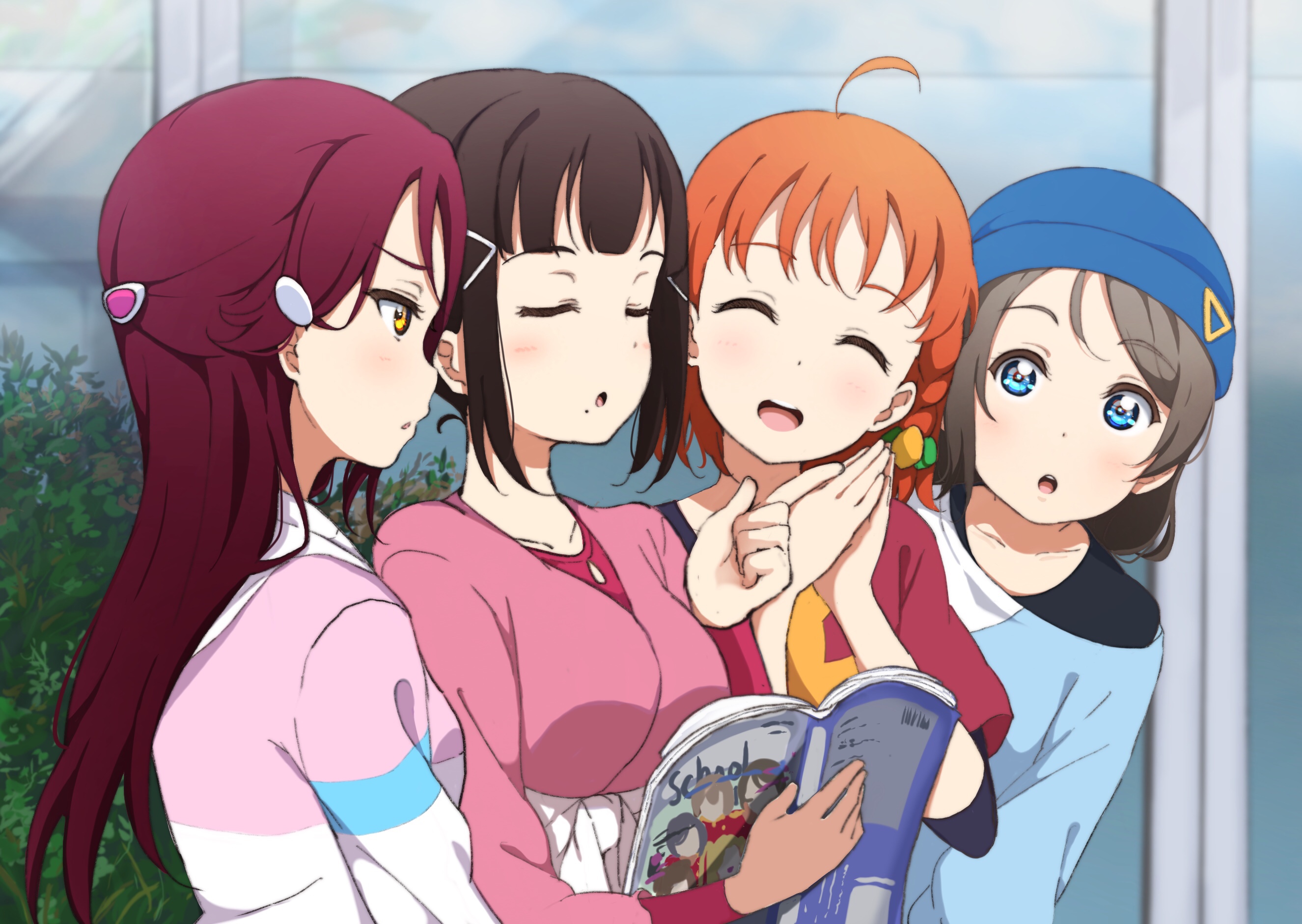 Four girls reading a magazine HD Wallpaper