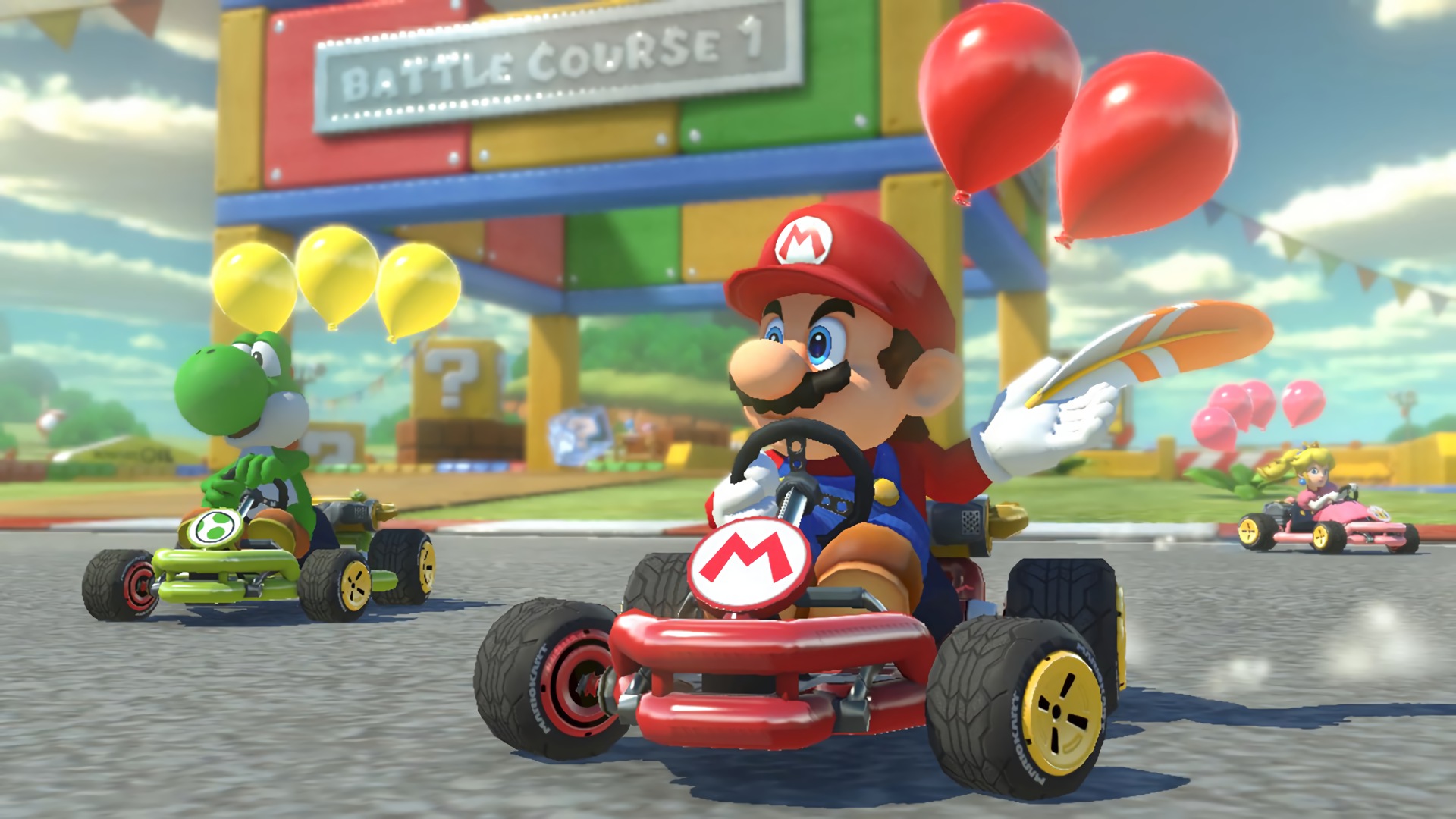 Mario Kart 8 Deluxe: Mario, Yoshi, and Peach racing HD Wallpaper
