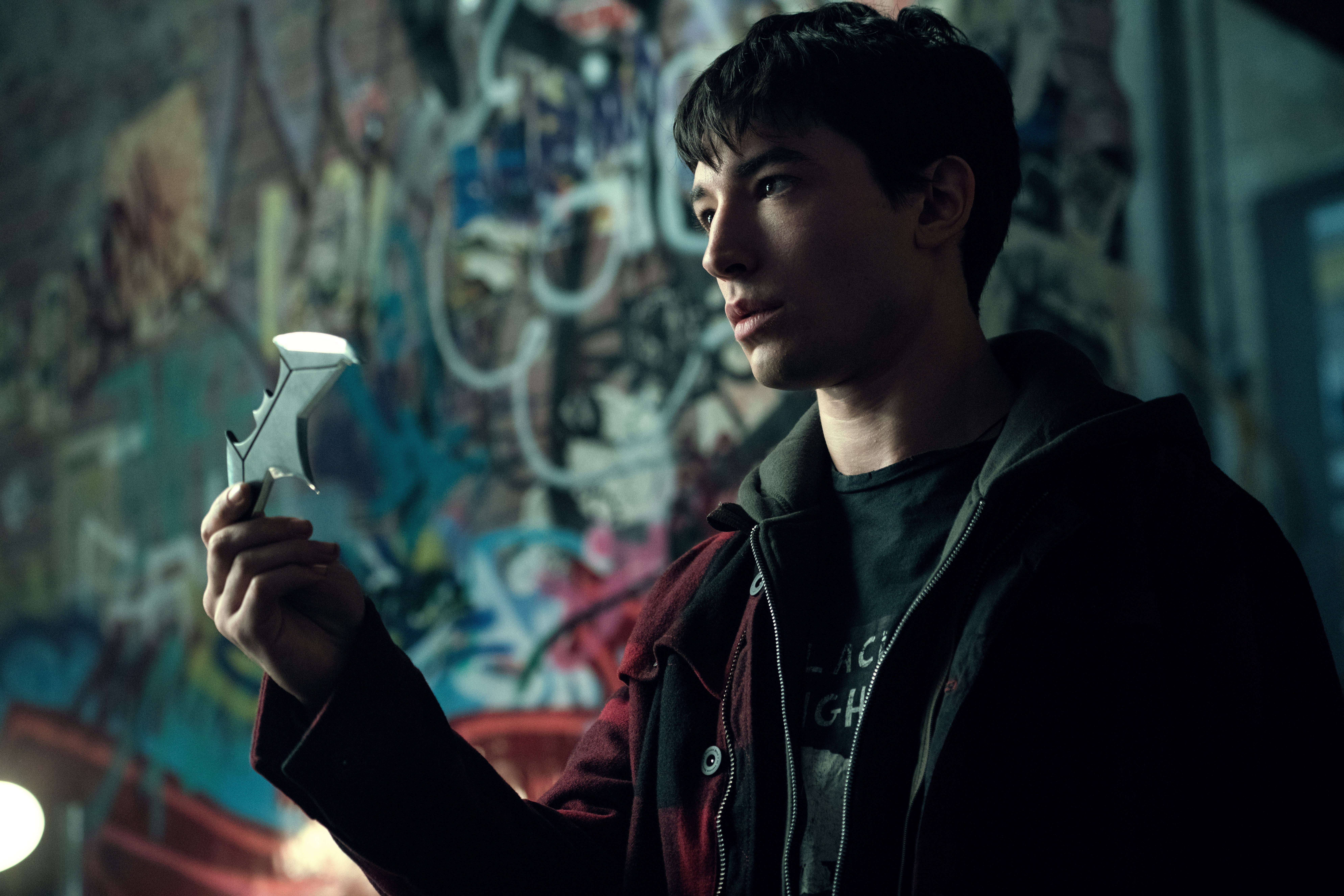 Barry Allen holding a batarang HD Wallpaper