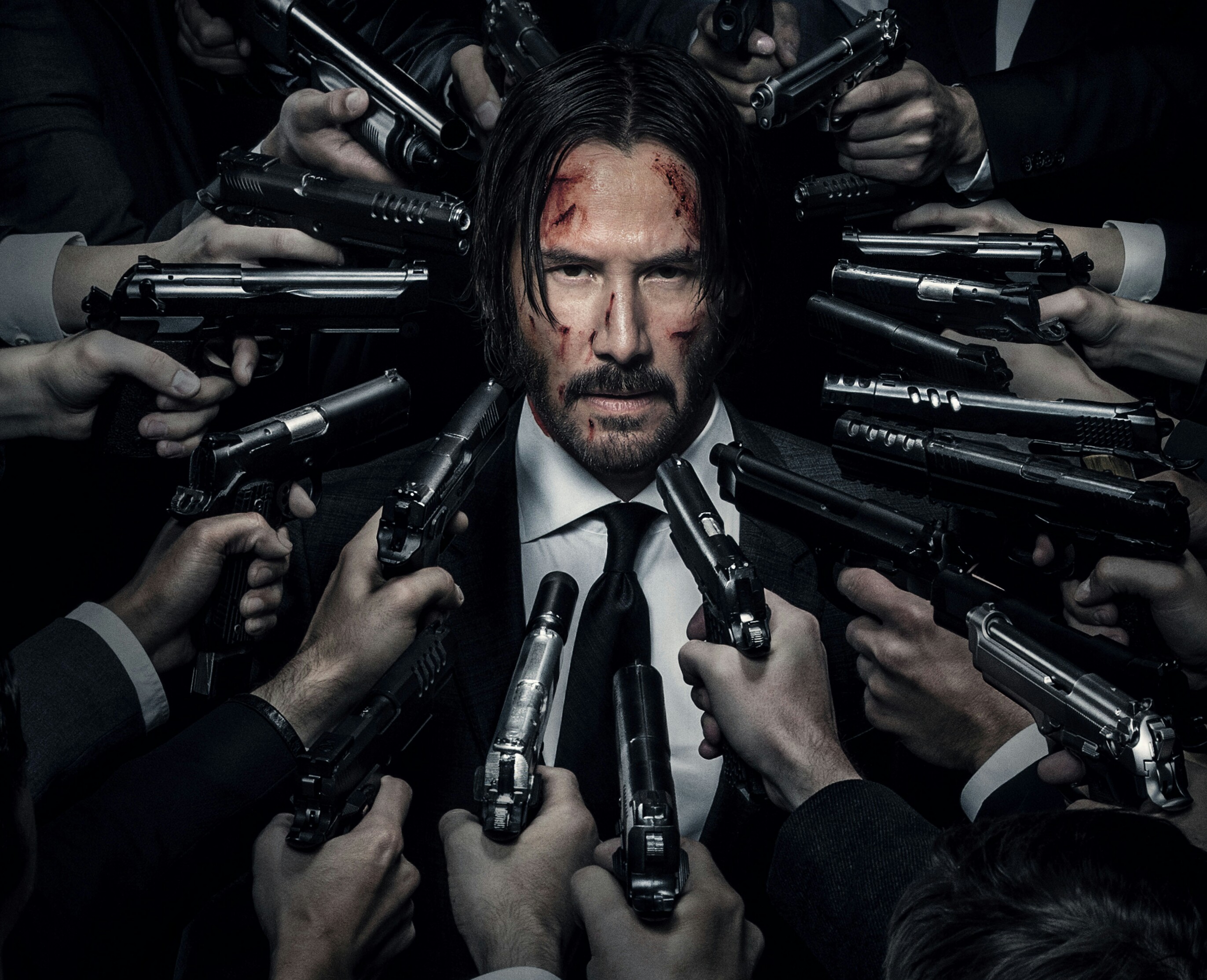 John Wick surrounded by guns HD Wallpaper