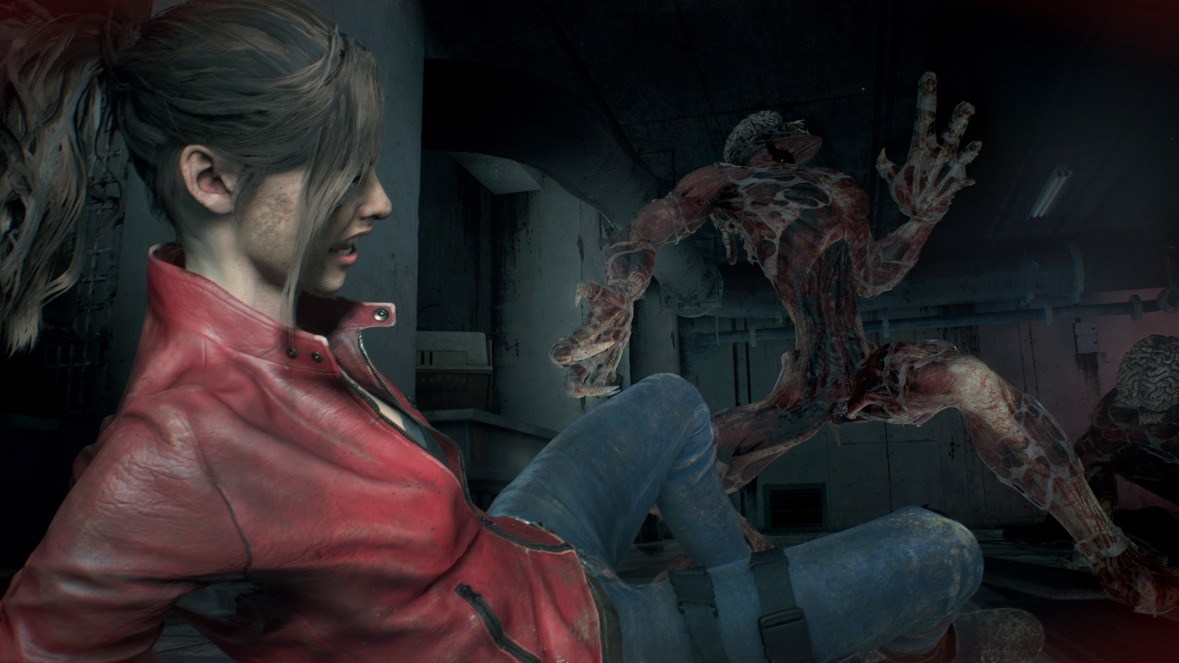 Claire Redfield fighting a monster in Resident Evil HD Wallpaper
