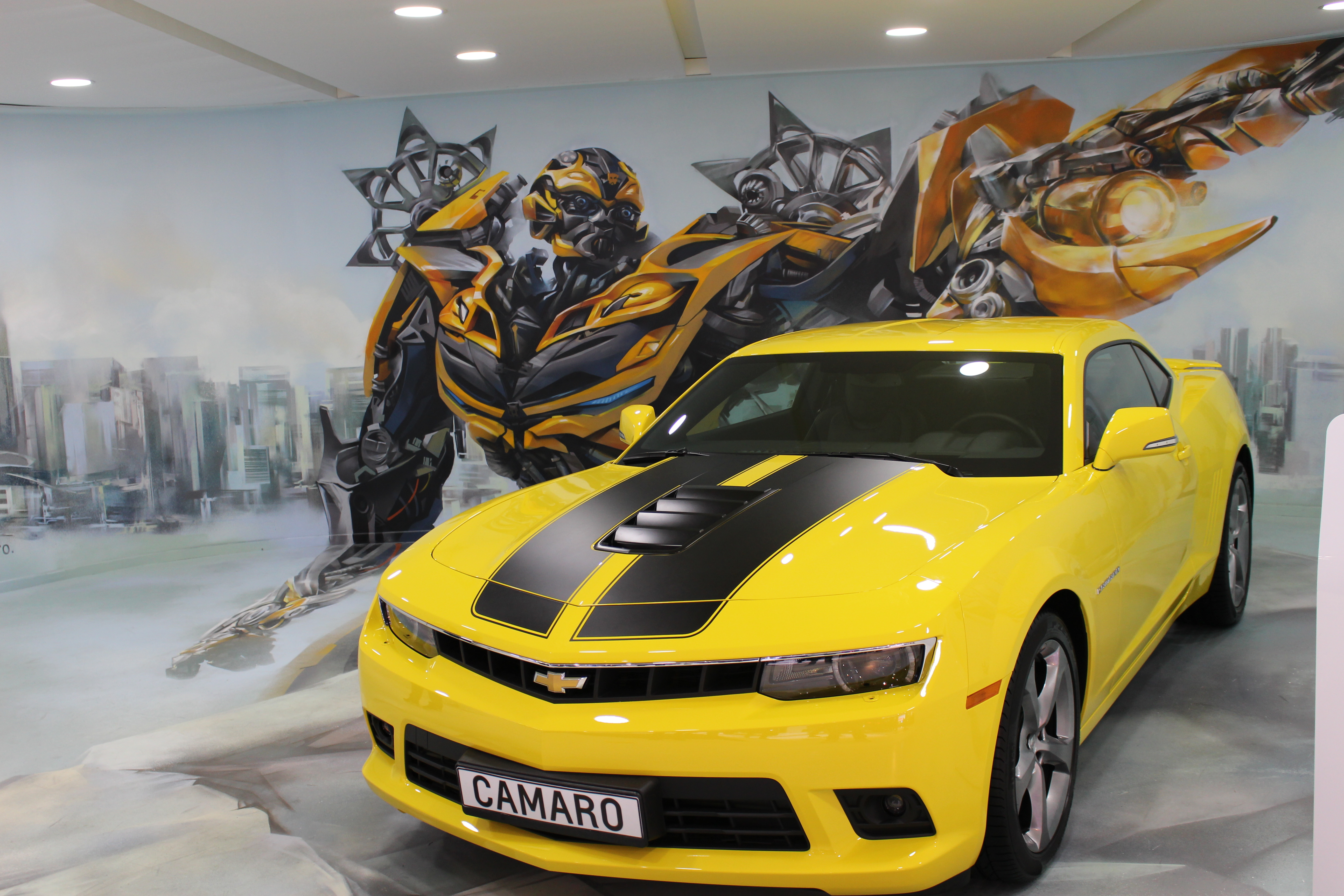 Yellow Chevrolet Camaro with Bumblebee mural HD Wallpaper