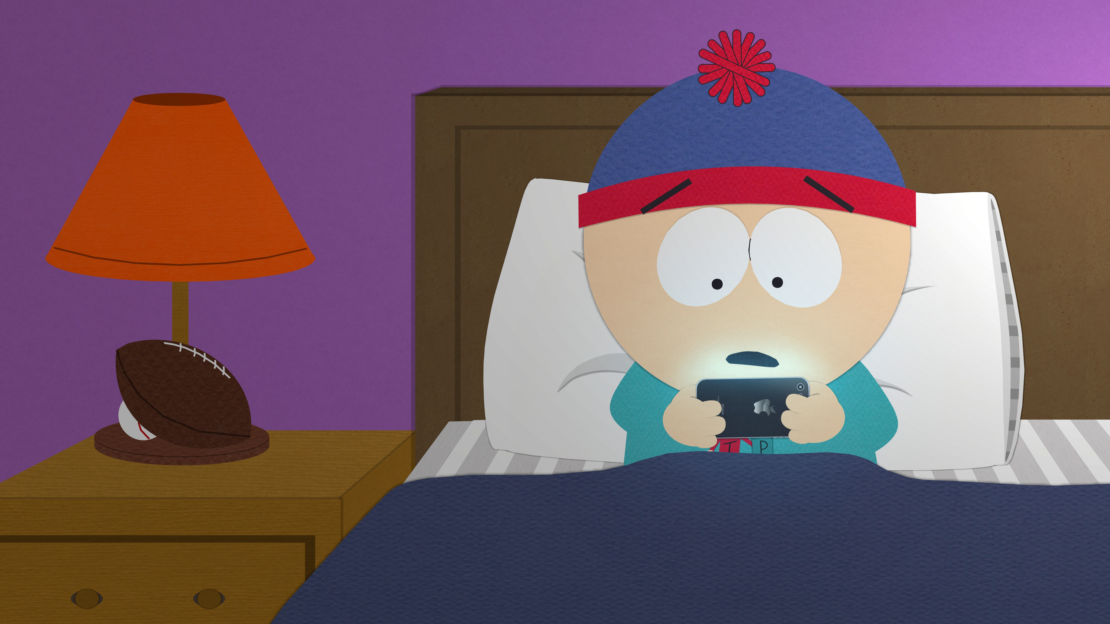 Stan Marsh from South Park playing on a phone HD Wallpaper