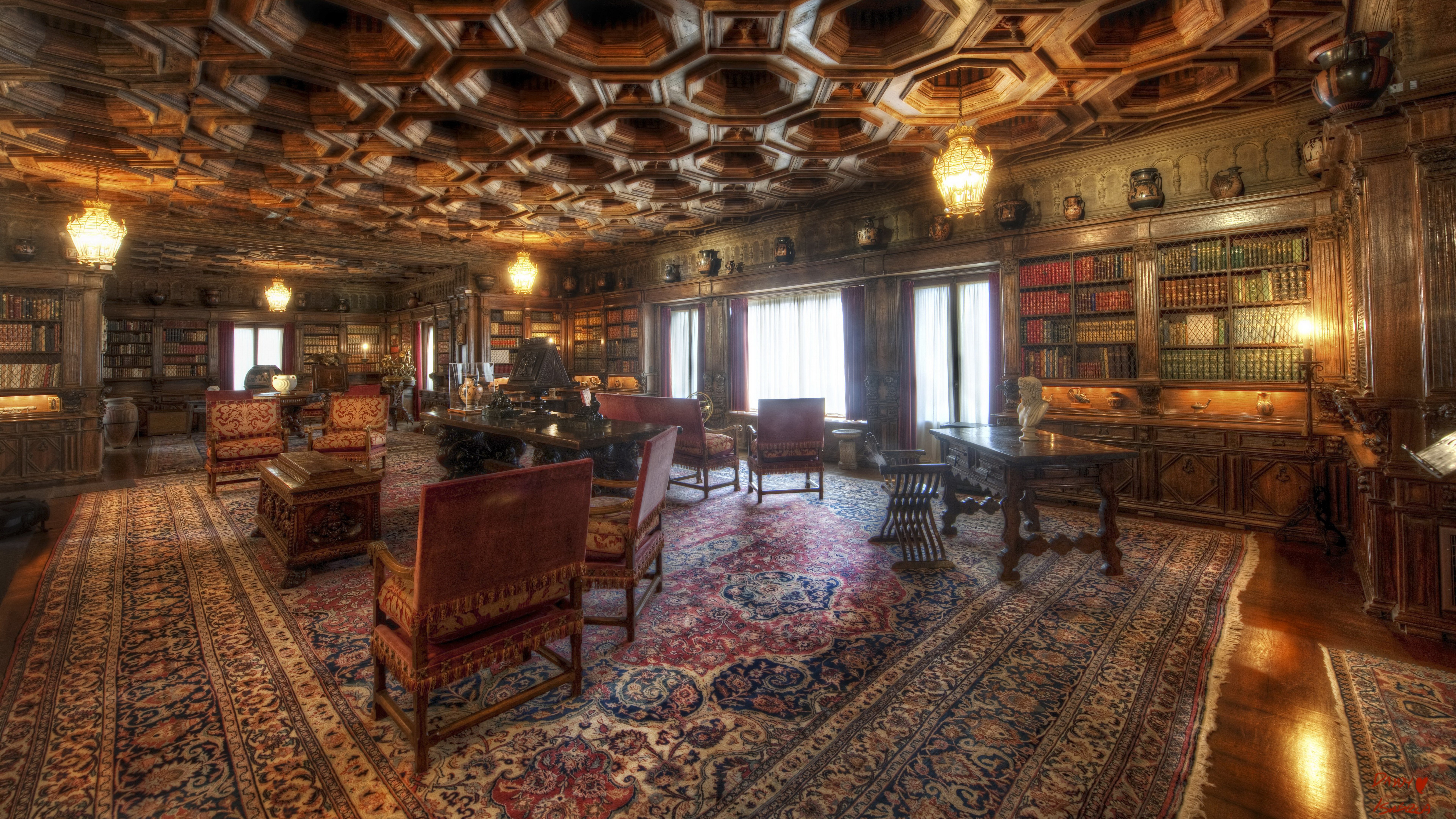 Ornate library with antique furniture and intricate ceiling HD Wallpaper