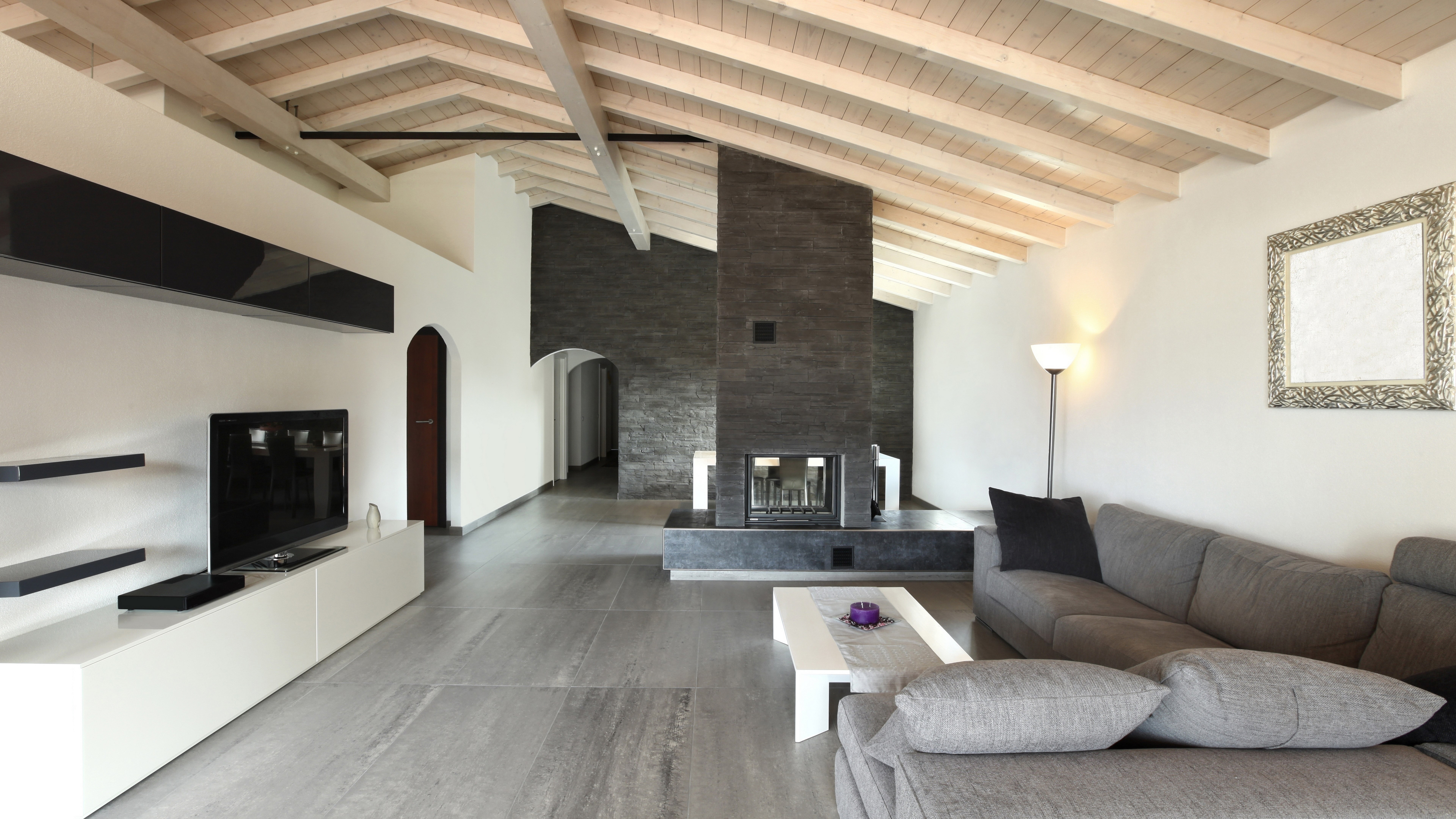 Modern living room with fireplace and television HD Wallpaper