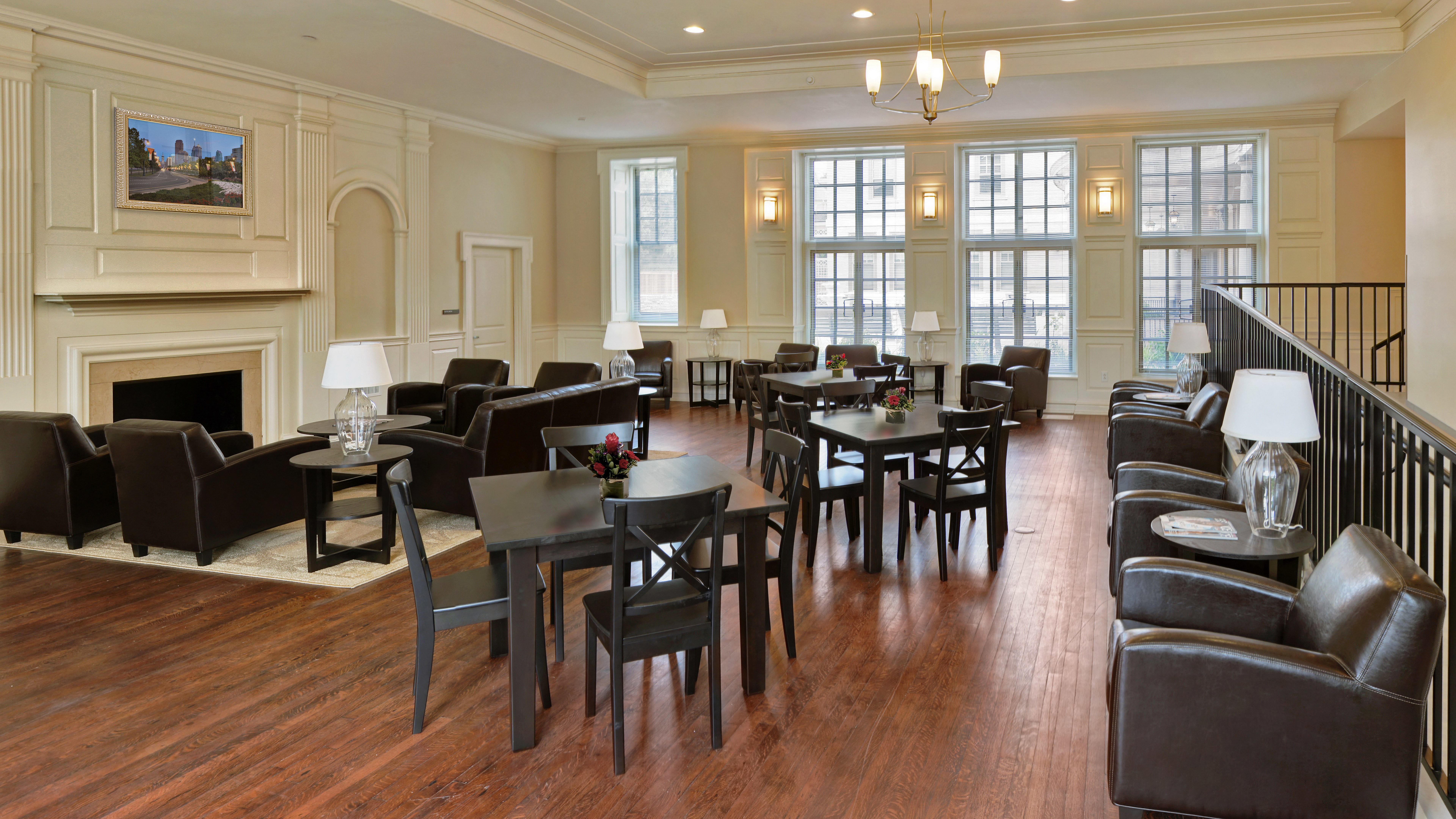 Lobby with fireplace, seating, and tables HD Wallpaper