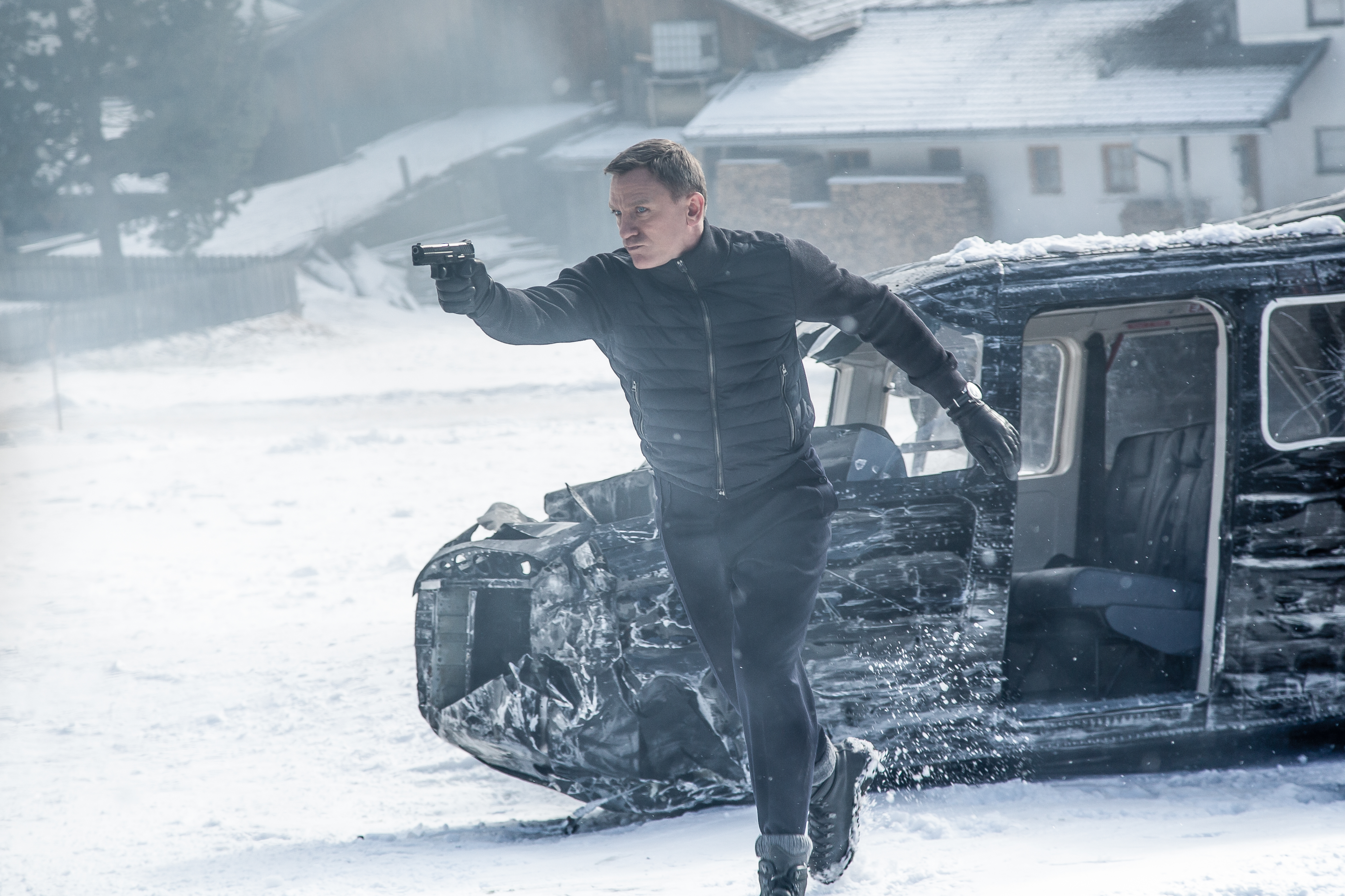 James Bond in a snowy environment with a crashed helicopter HD Wallpaper