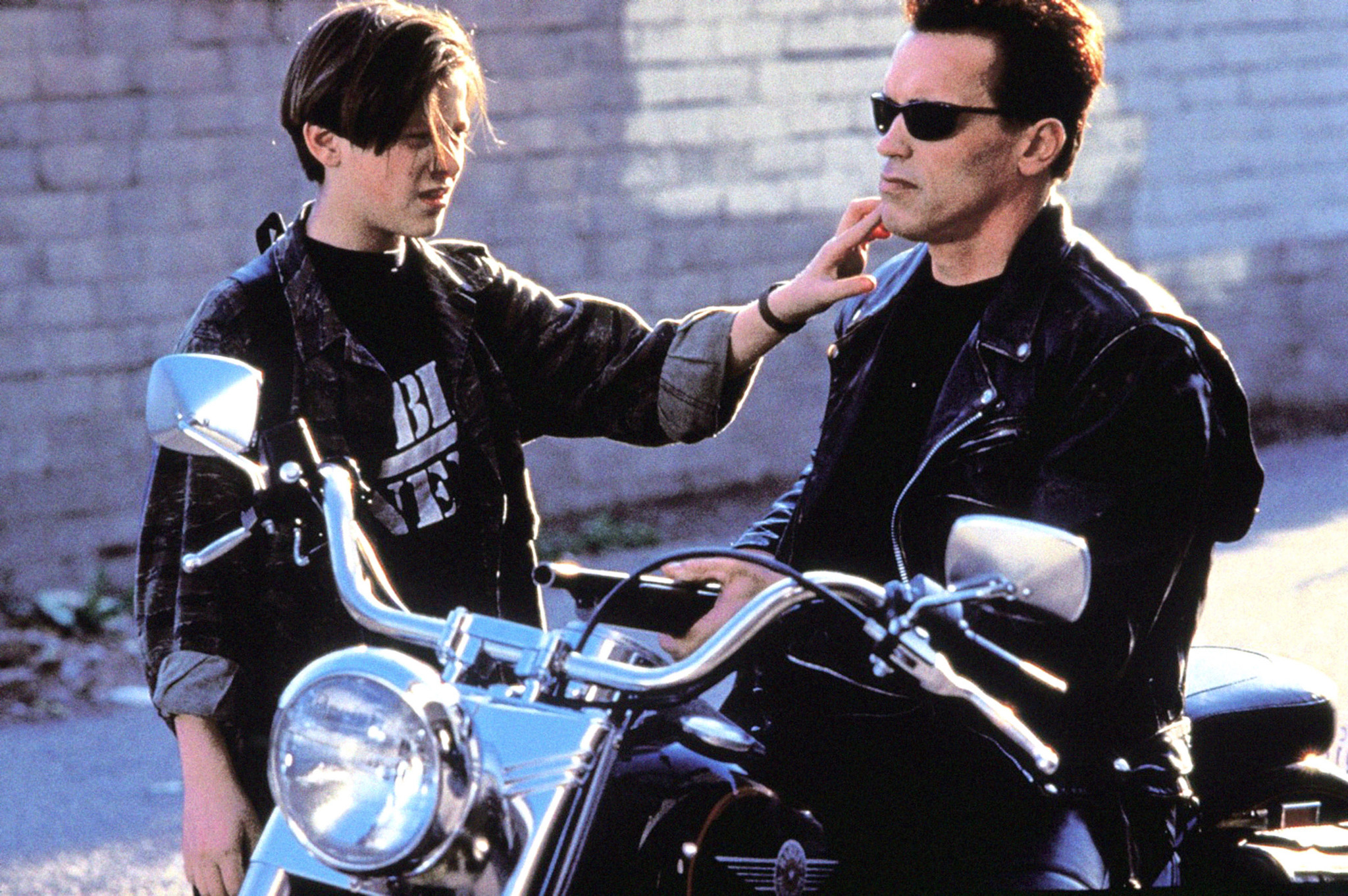 The Terminator and John Connor on a motorcycle HD Wallpaper