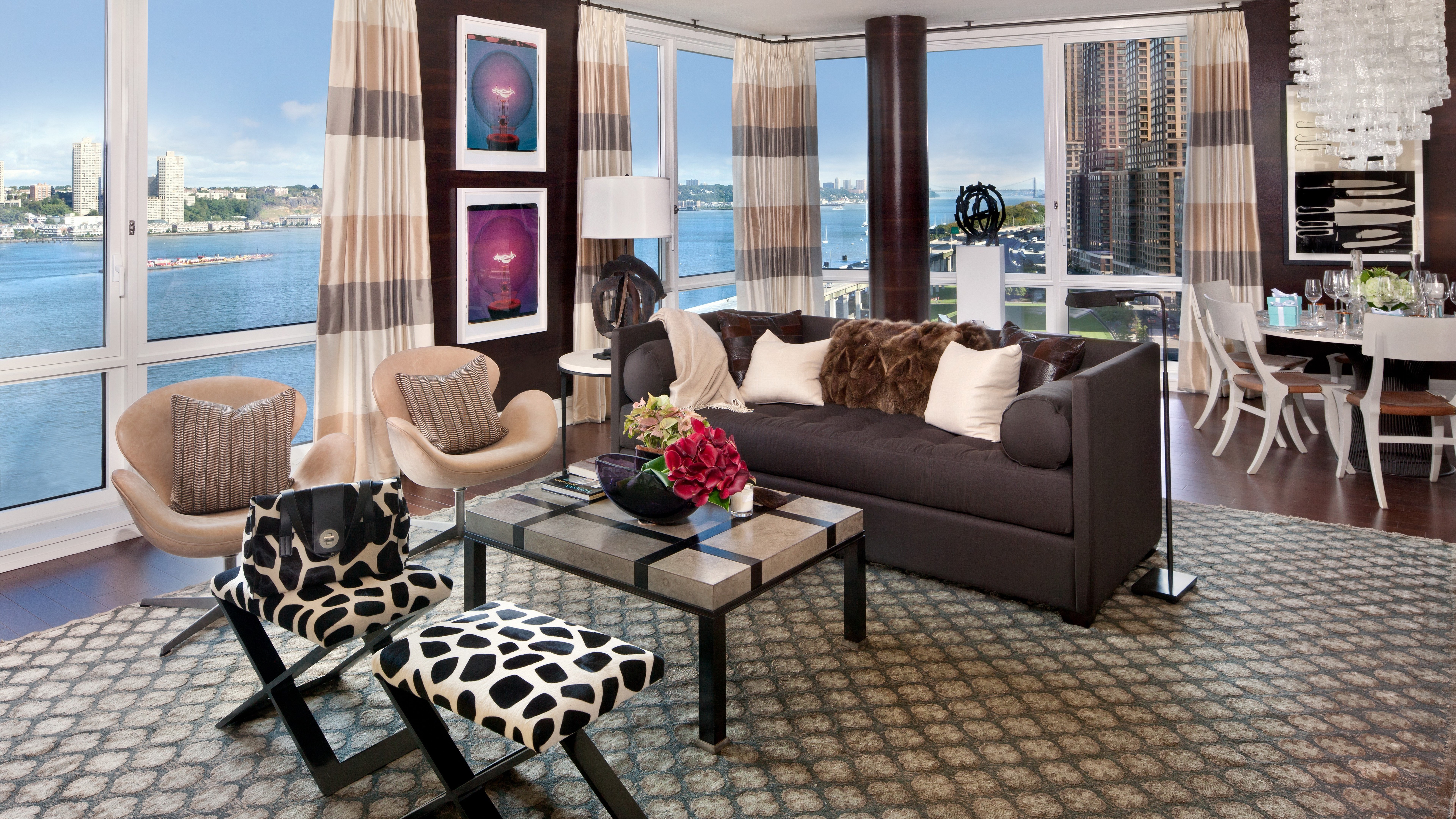 Living room with city view and dining area HD Wallpaper