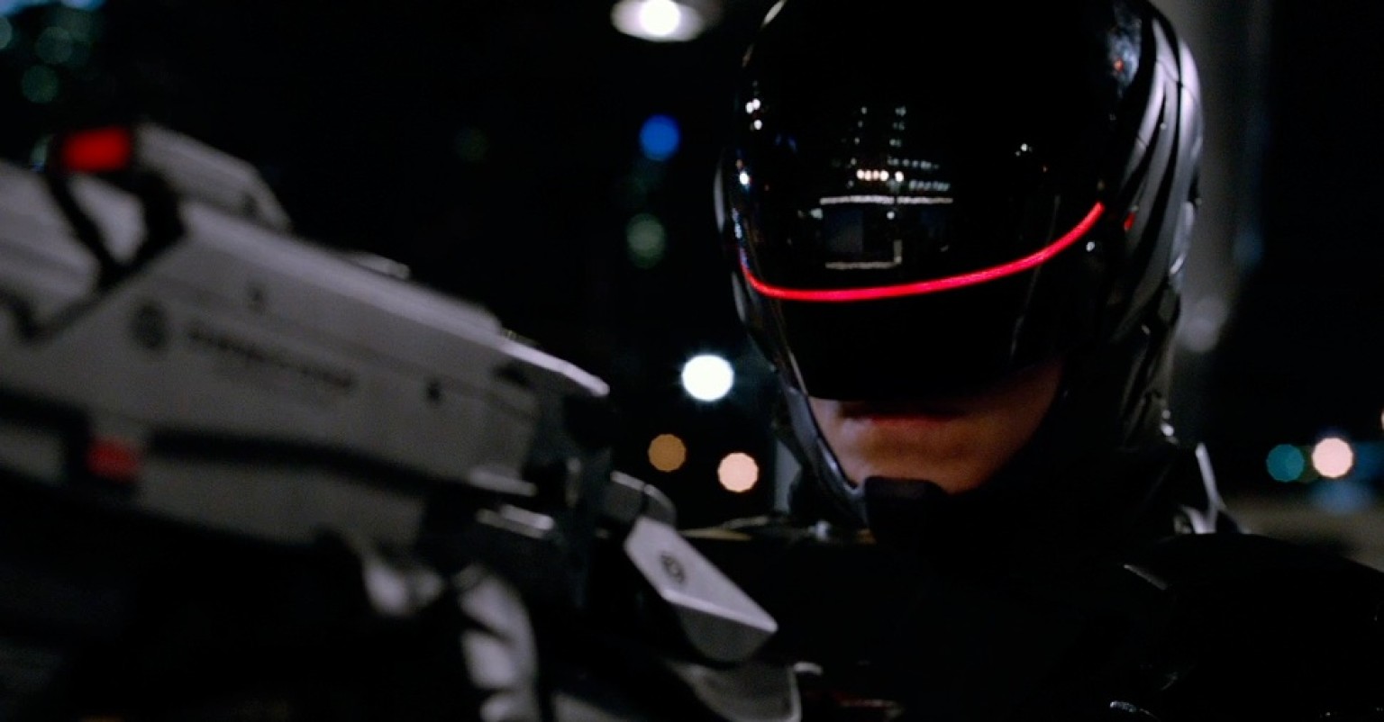 RoboCop holding a gun HD Wallpaper