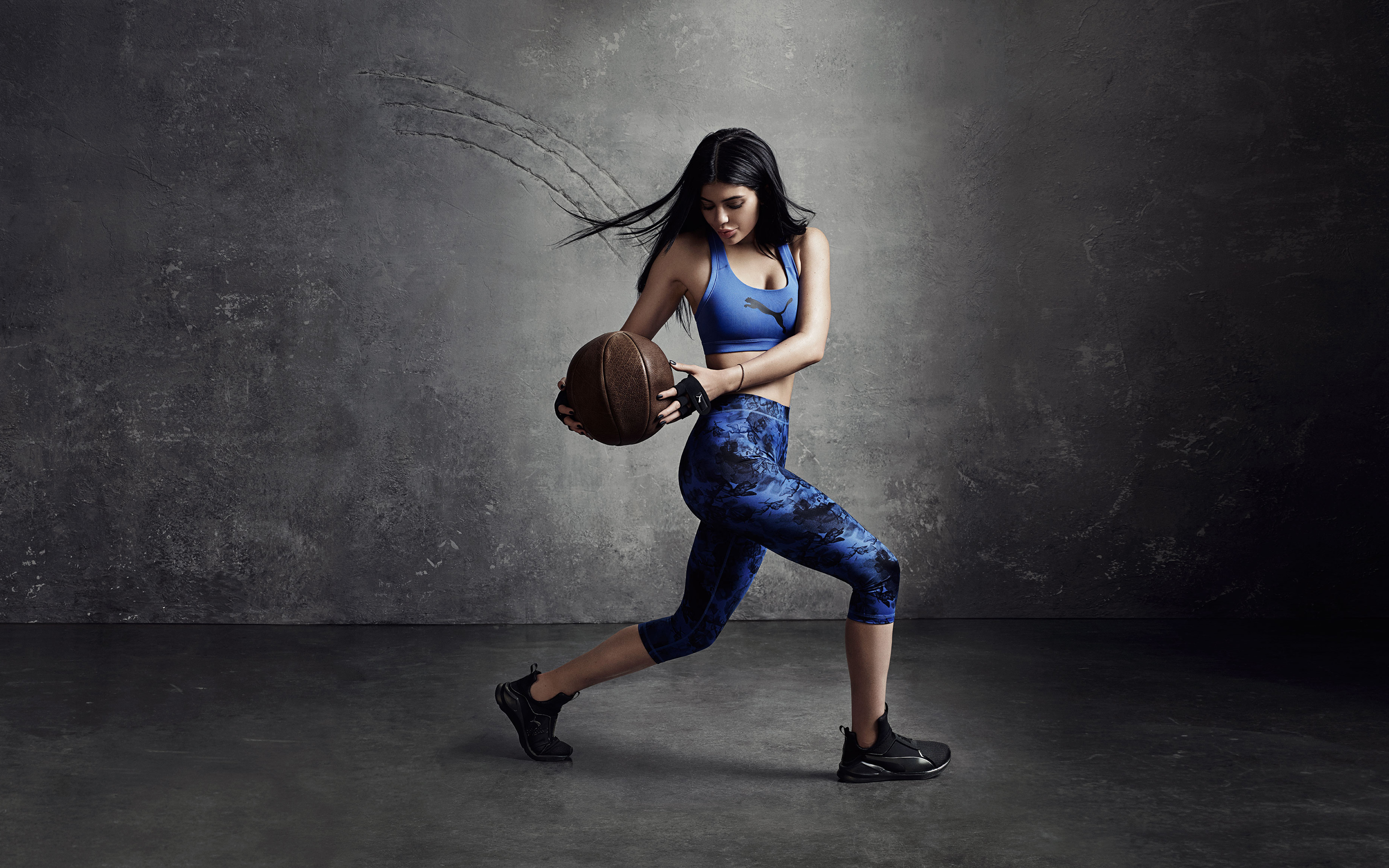 Kylie Jenner holding a basketball for Puma HD Wallpaper