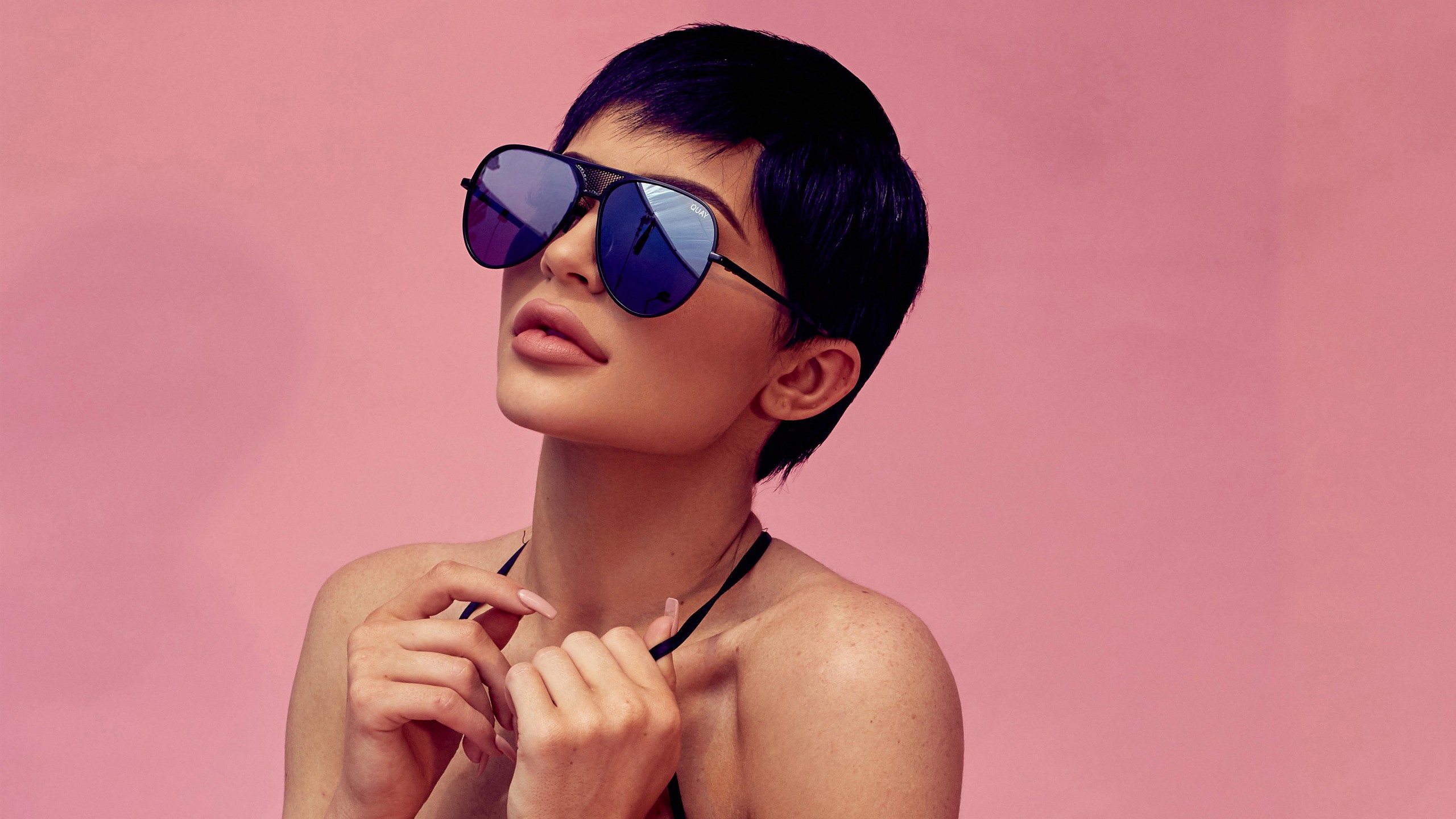Kylie Jenner with short hair and sunglasses HD Wallpaper