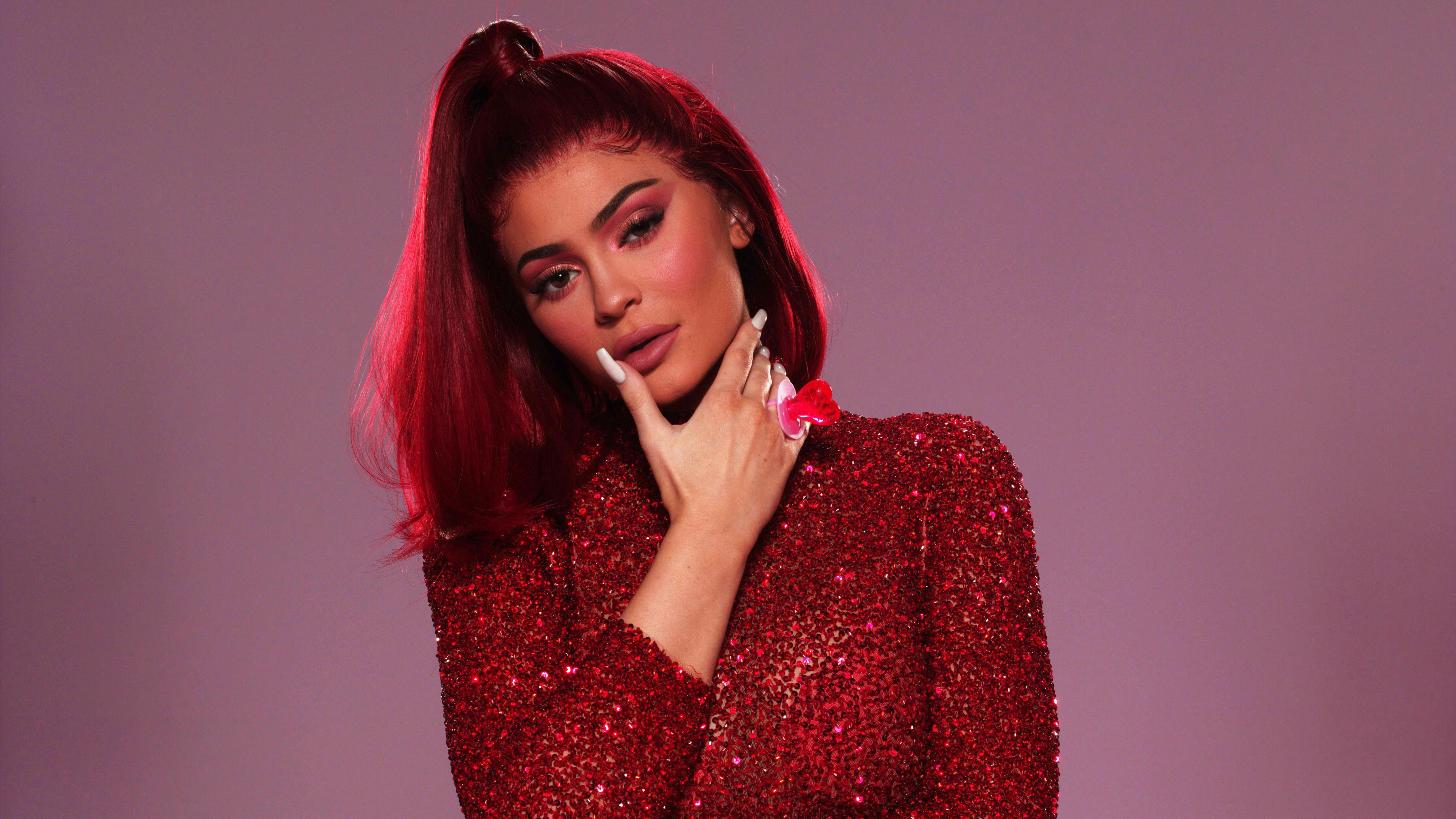 Kylie Jenner in a red sequined dress HD Wallpaper