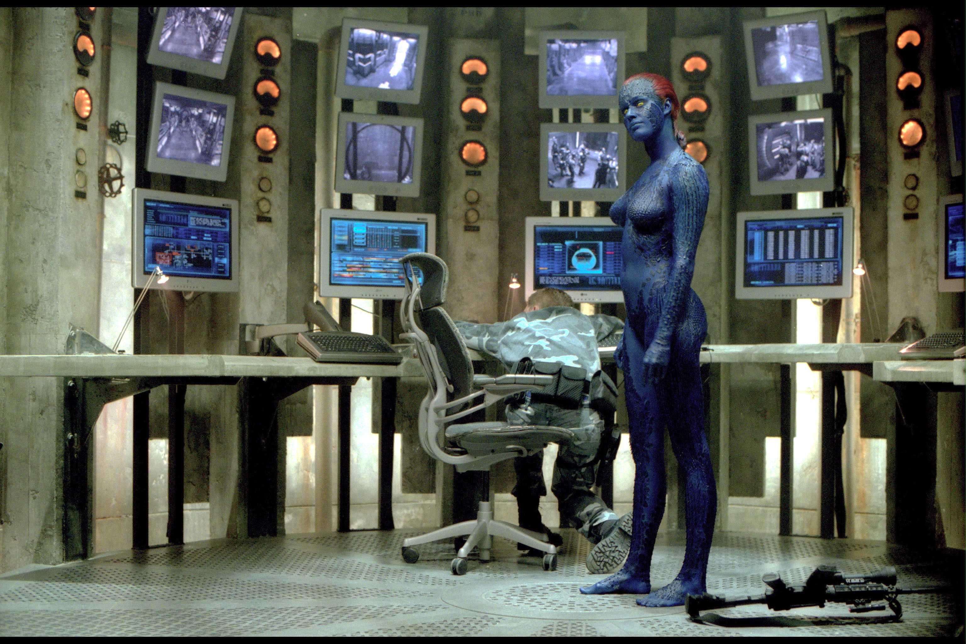 Mystique from X-Men in a control room HD Wallpaper
