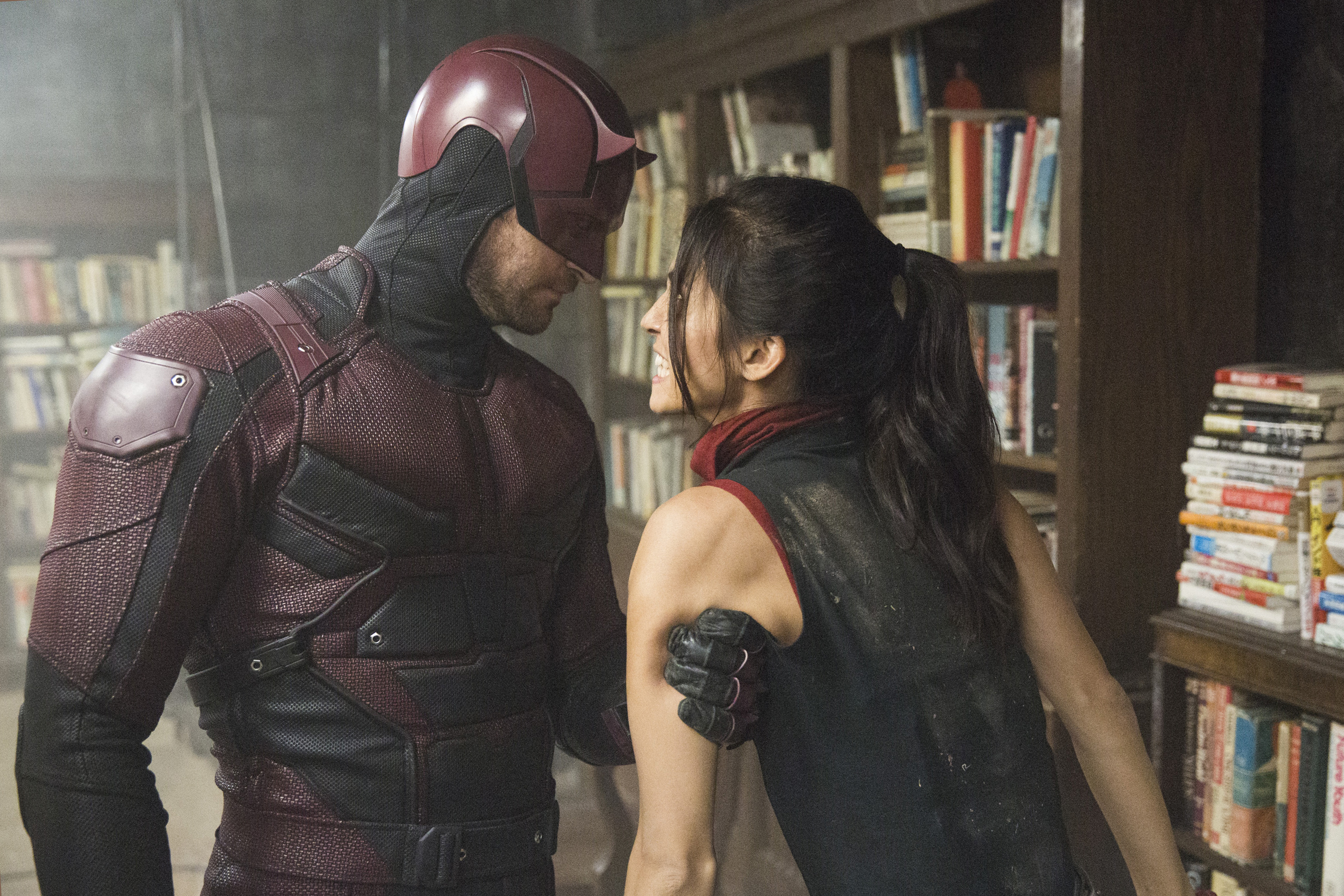 Daredevil and Elektra Natchios in a library HD Wallpaper