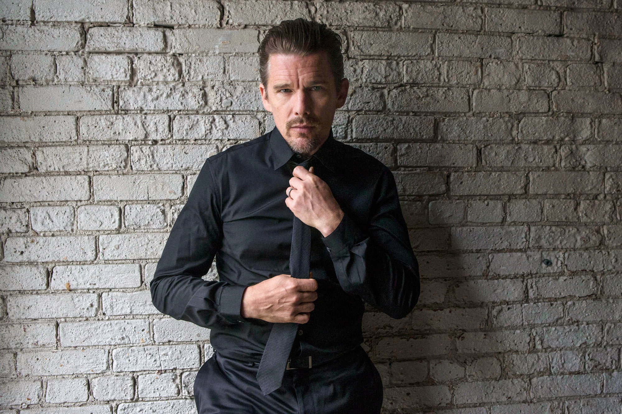 Ethan Hawke adjusting his tie HD Wallpaper