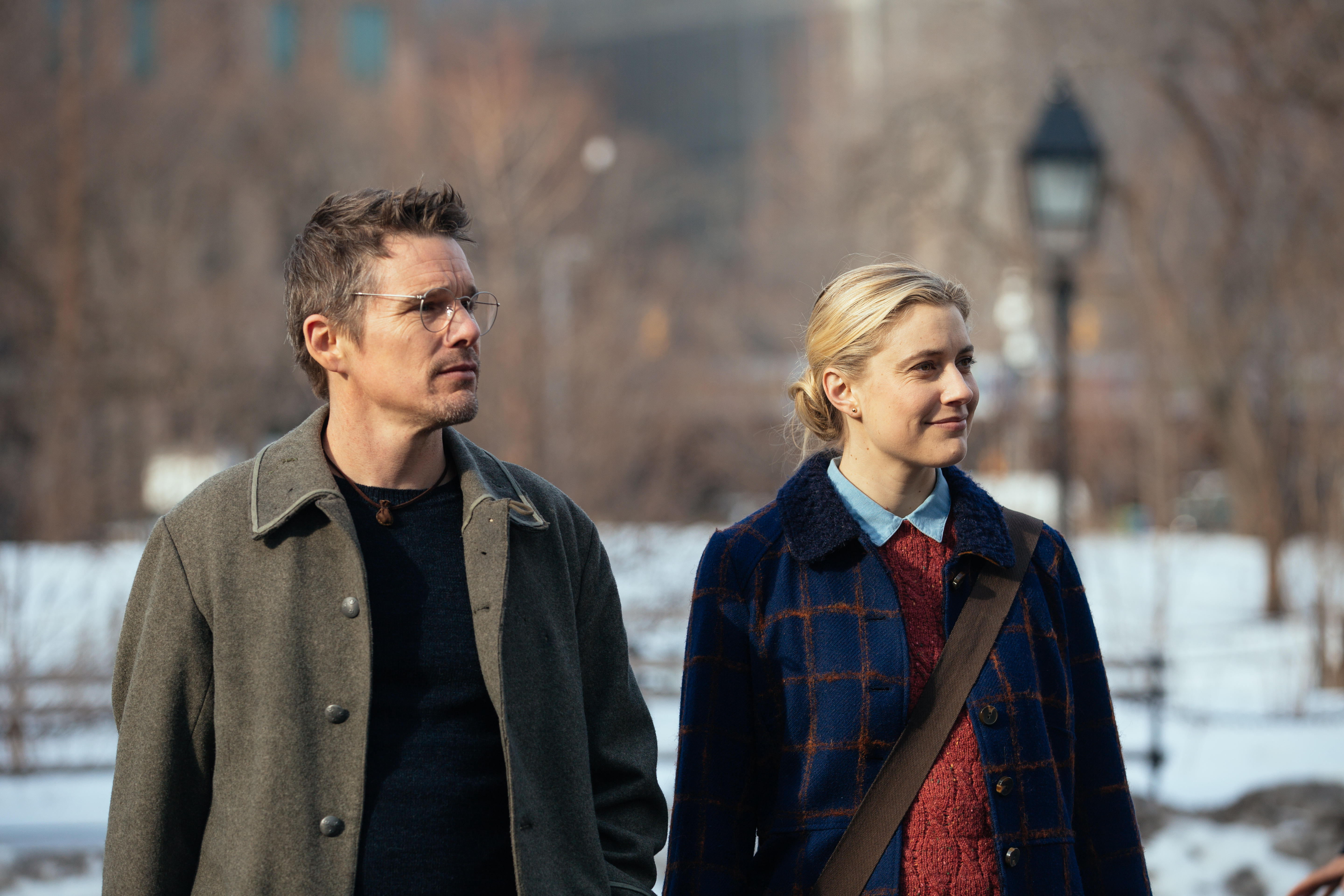 Ethan Hawke and Greta Gerwig walking in a park HD Wallpaper